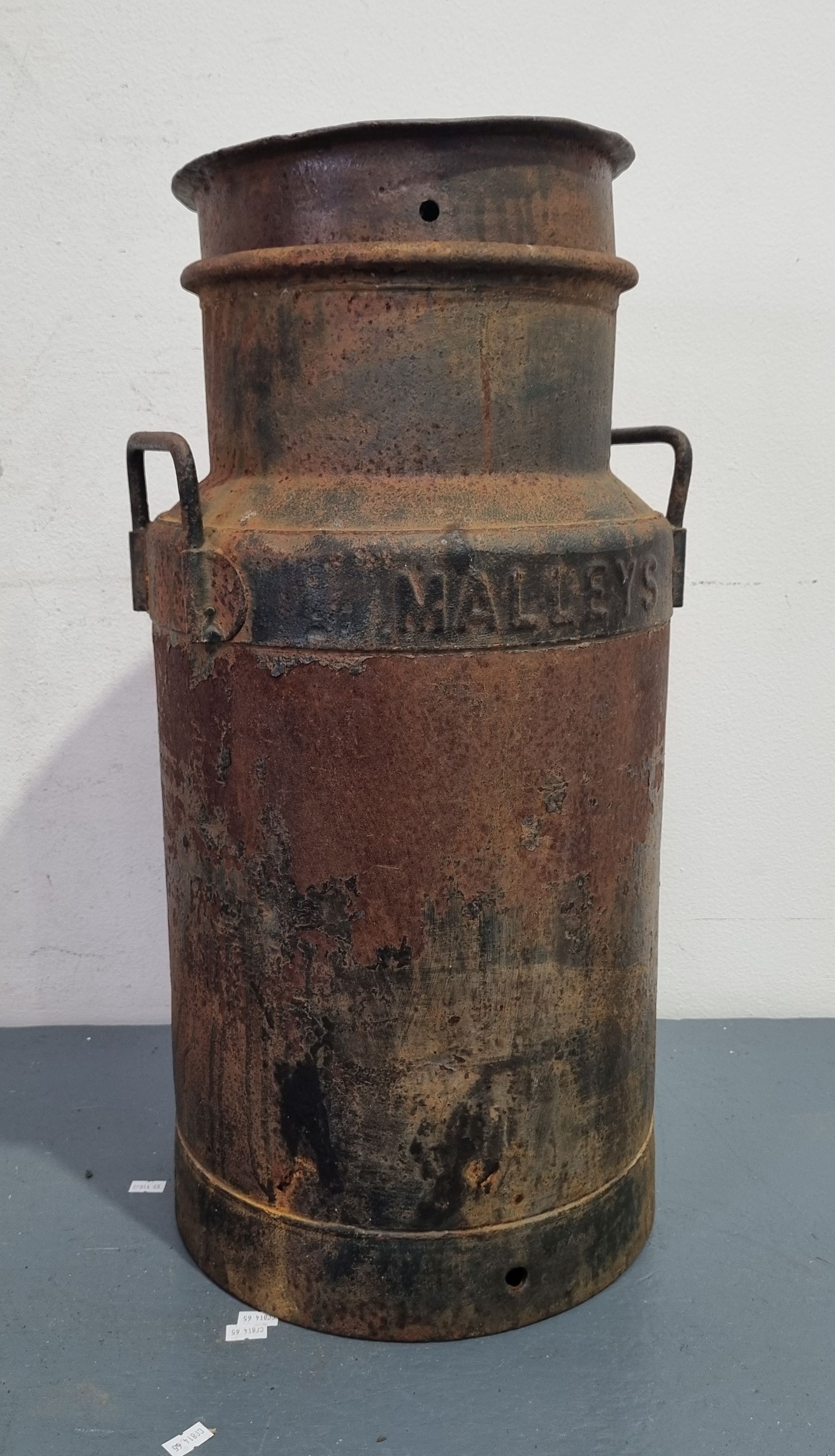 A Vintage Malleys Milk Churn
