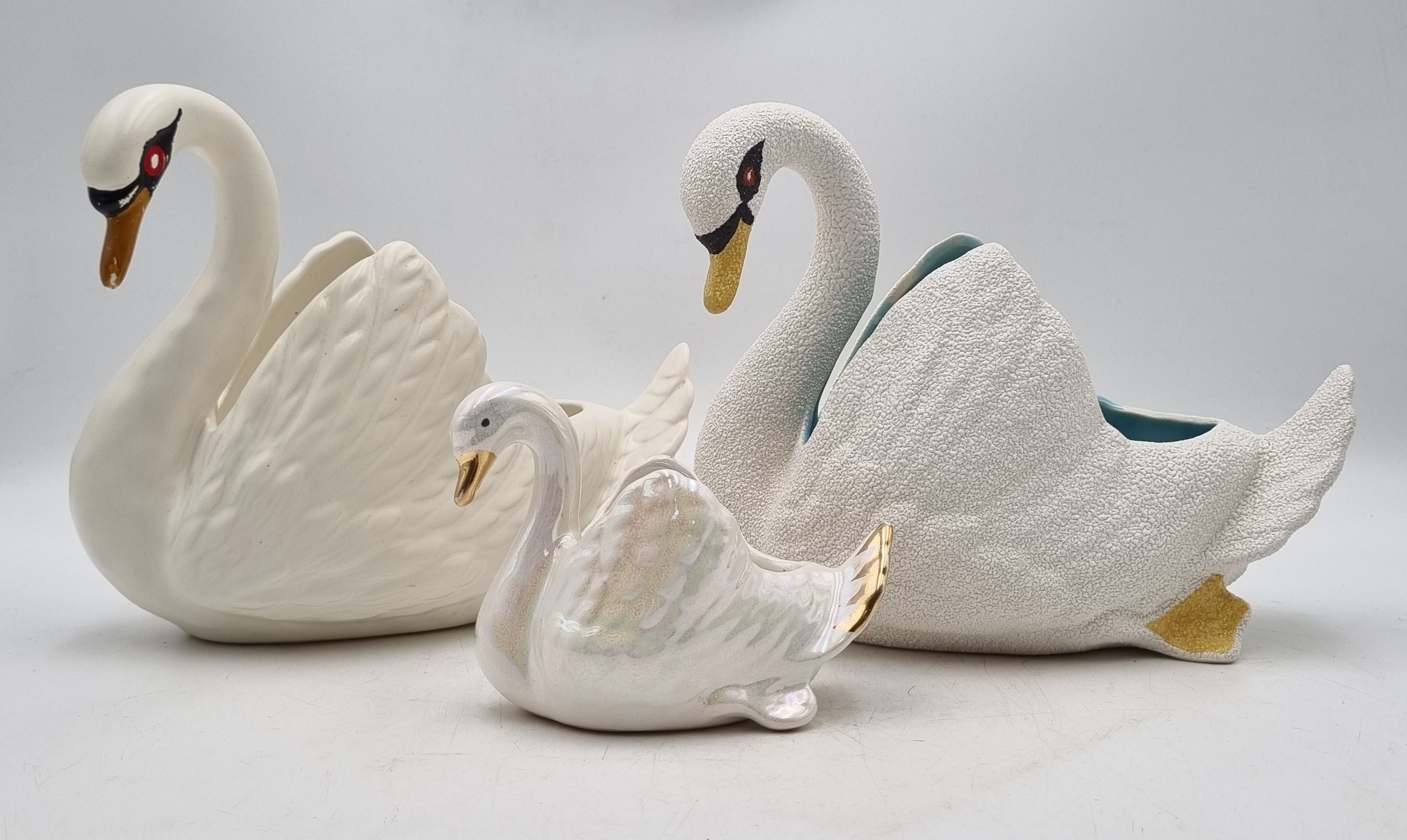 640 · THREE MCP POTTERY SWAN FORM BOWLS