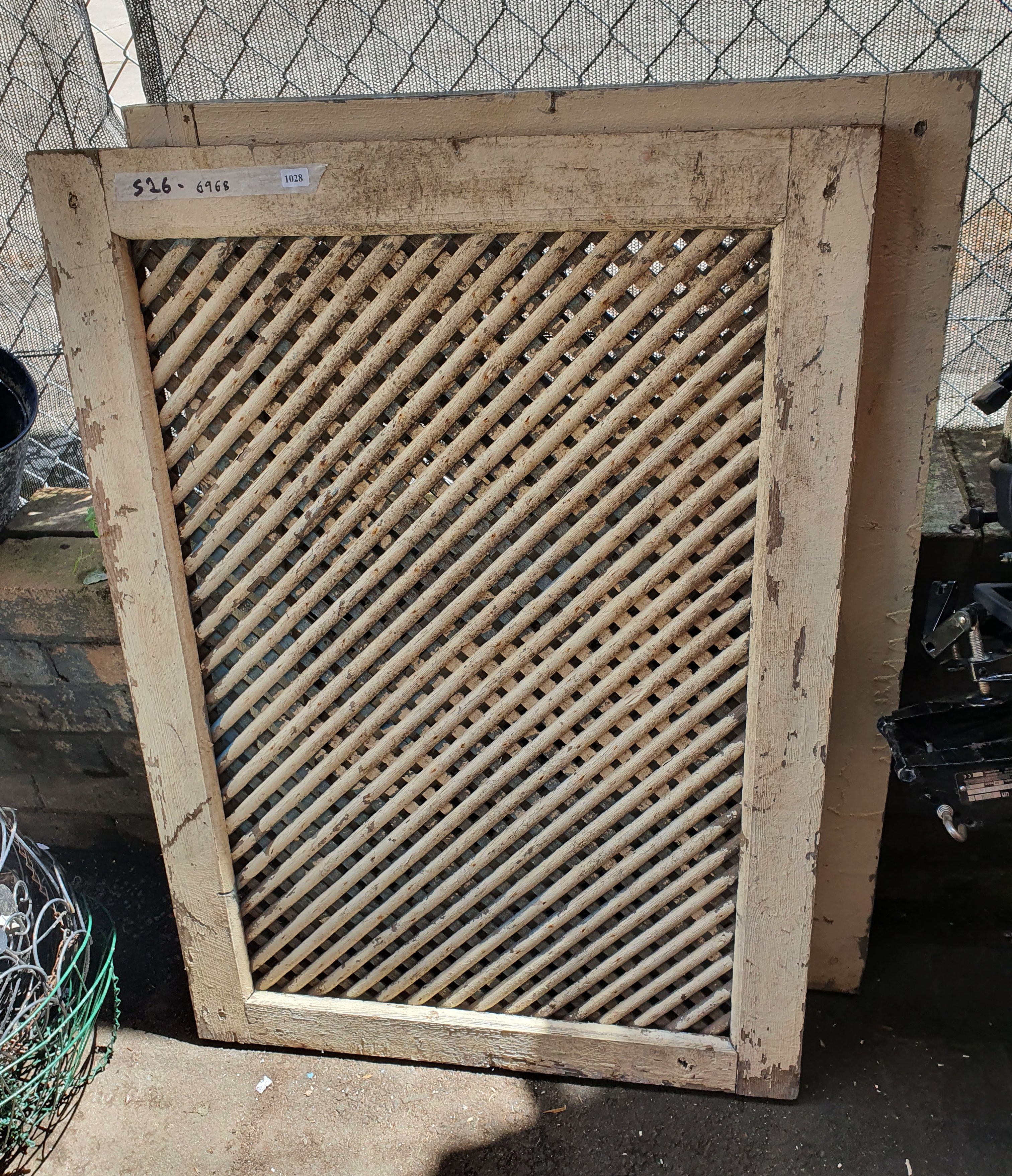 two timber lattice panels 110 x 74 cm