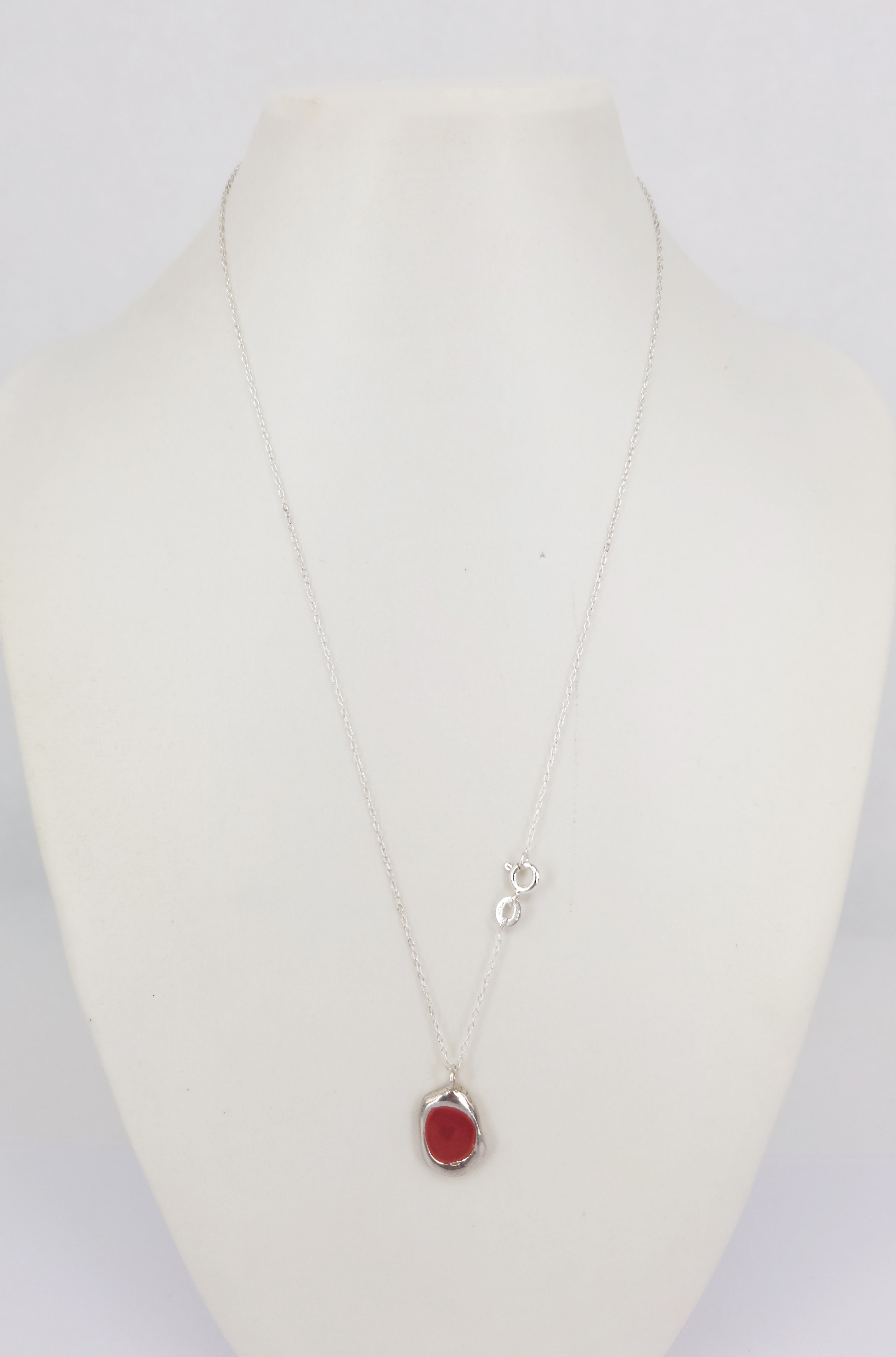 A Sterling Silver 'Drop Of Red' Enamel Freeform Pendant