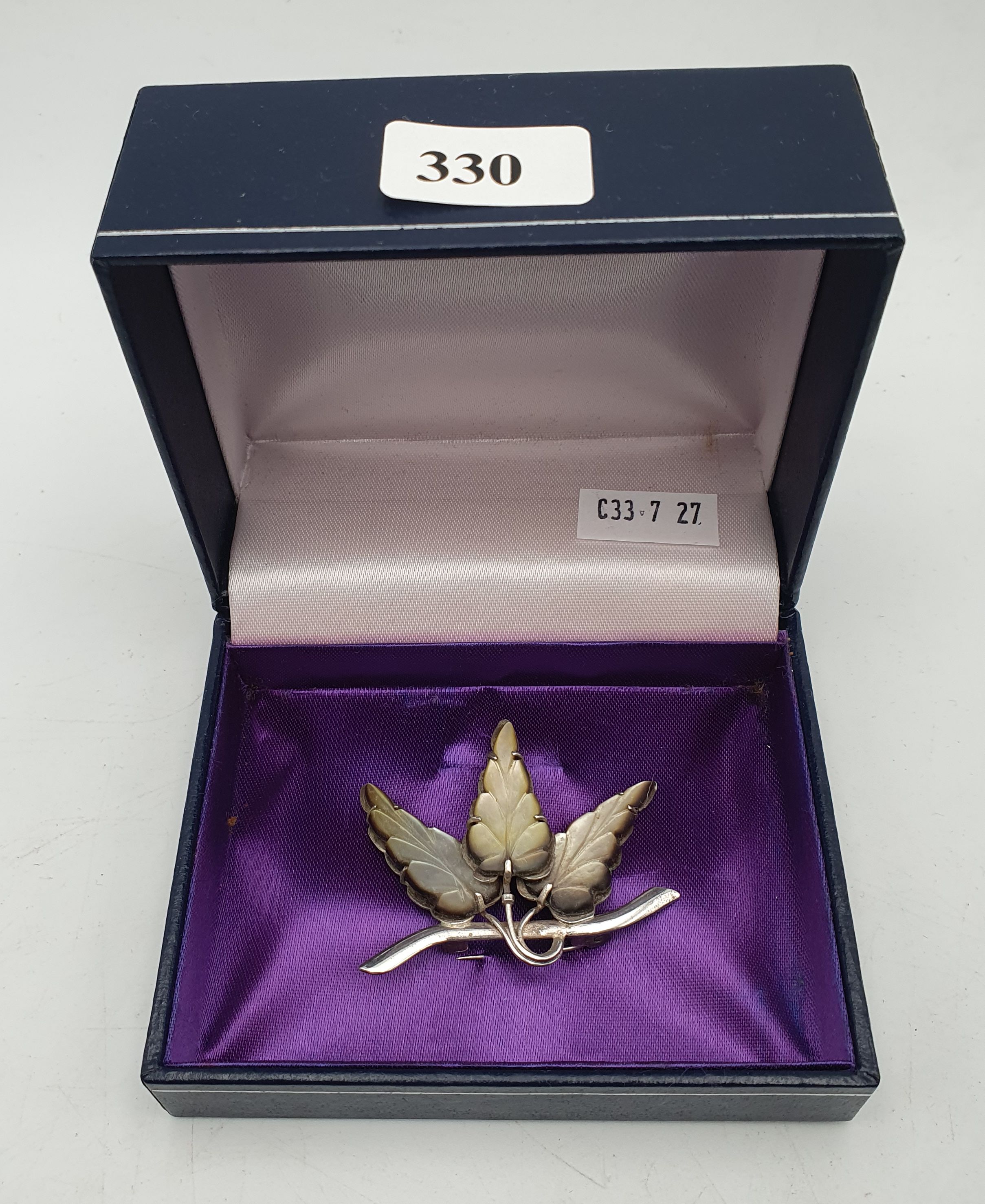 232 · A SILVER BROOCH