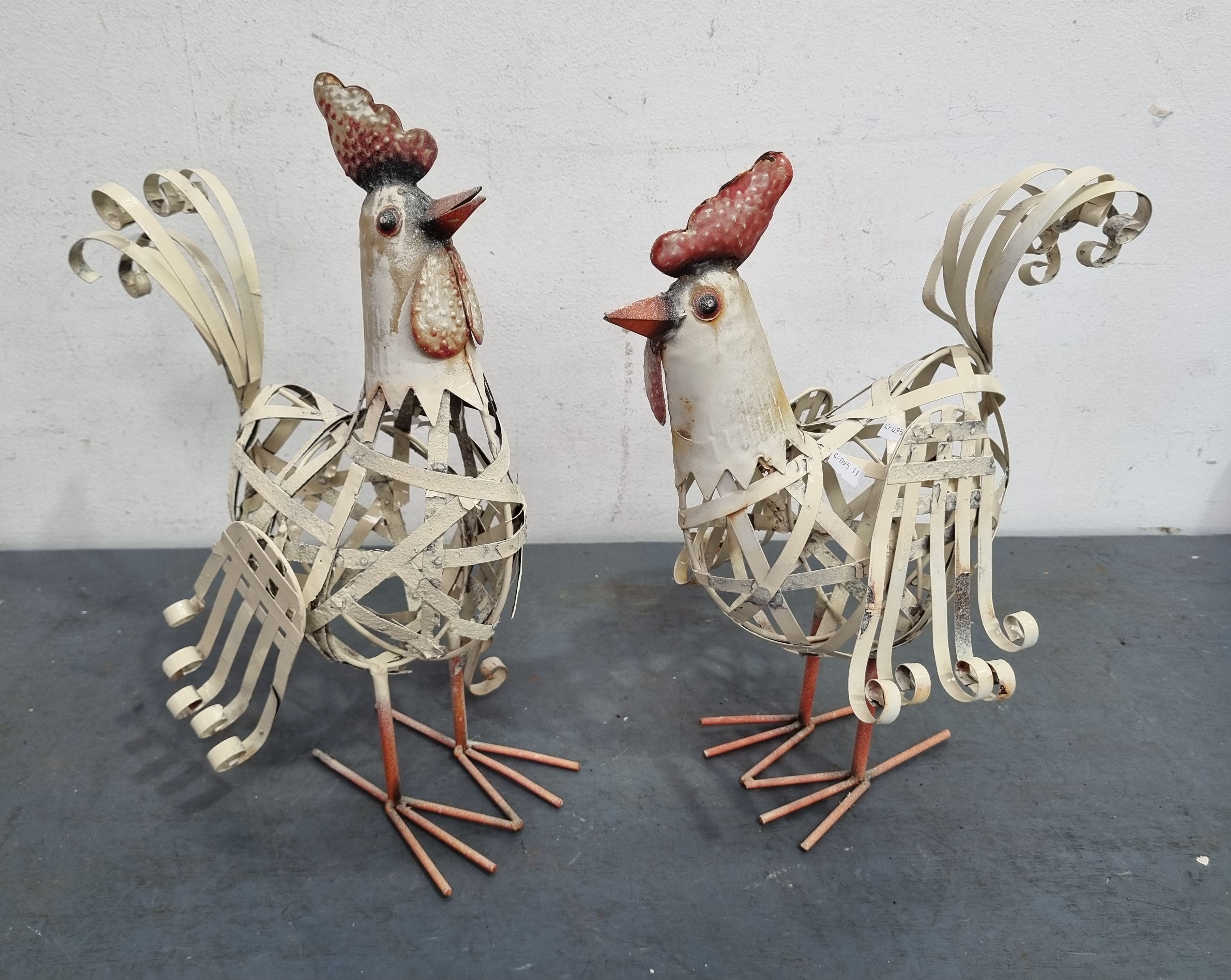 A Pair Of Decorative Garden Rooster Sculptures