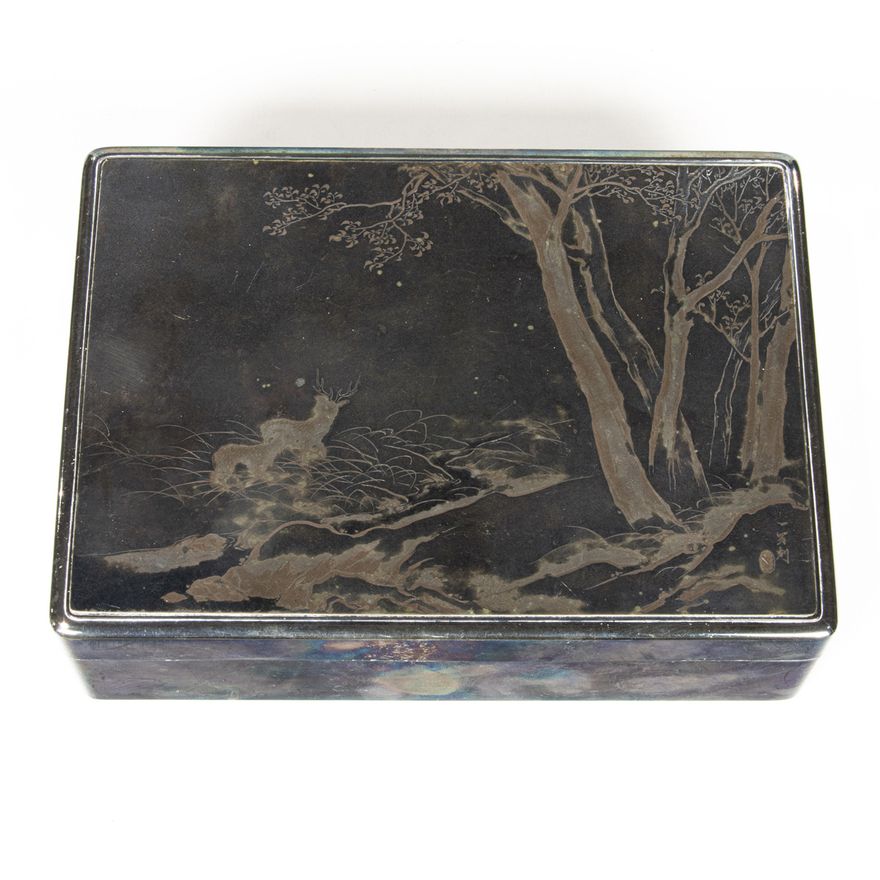 A Japanese silver plate box with etched landscape decoration