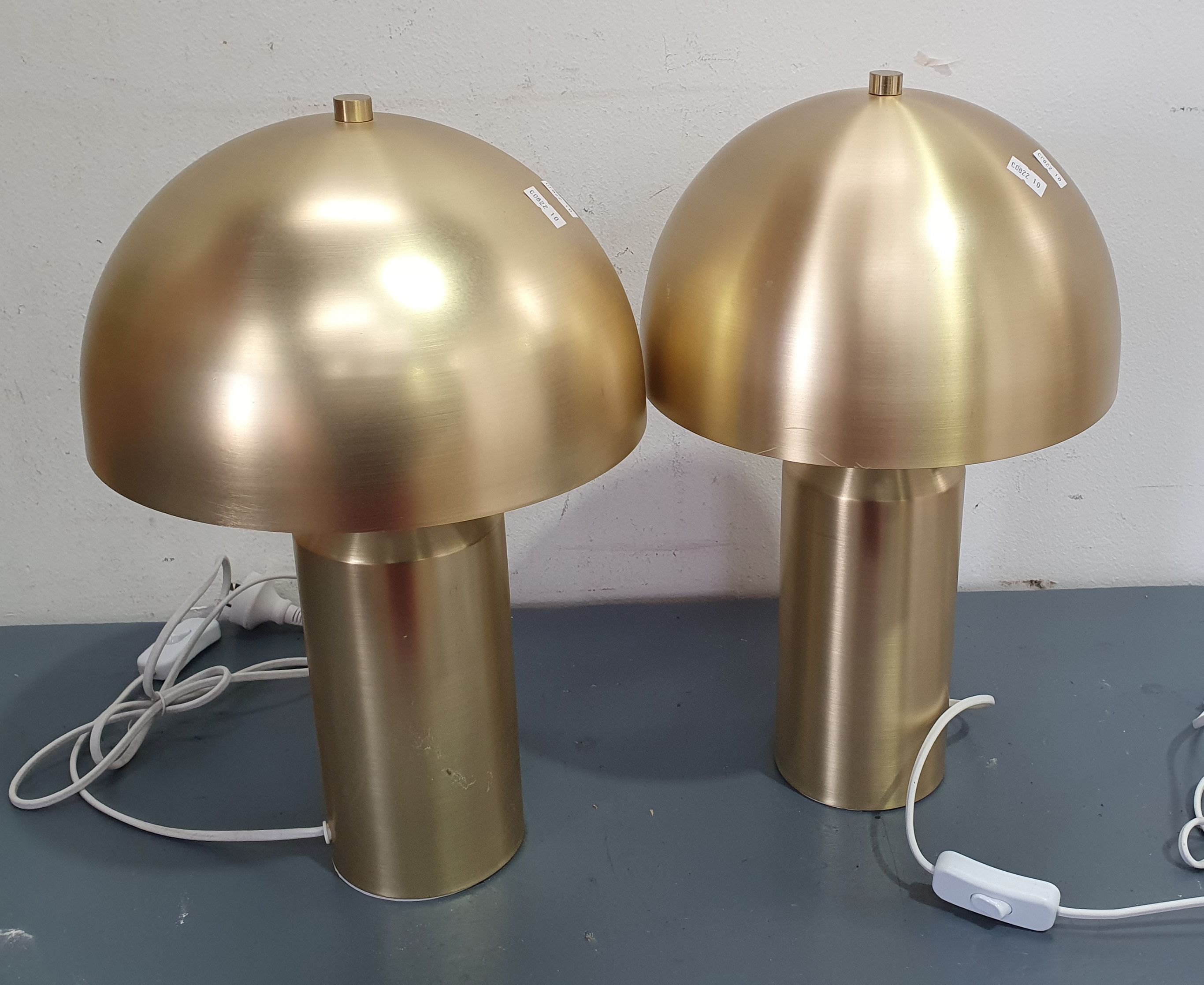 A Pair Of Gold Colour Table Lamps