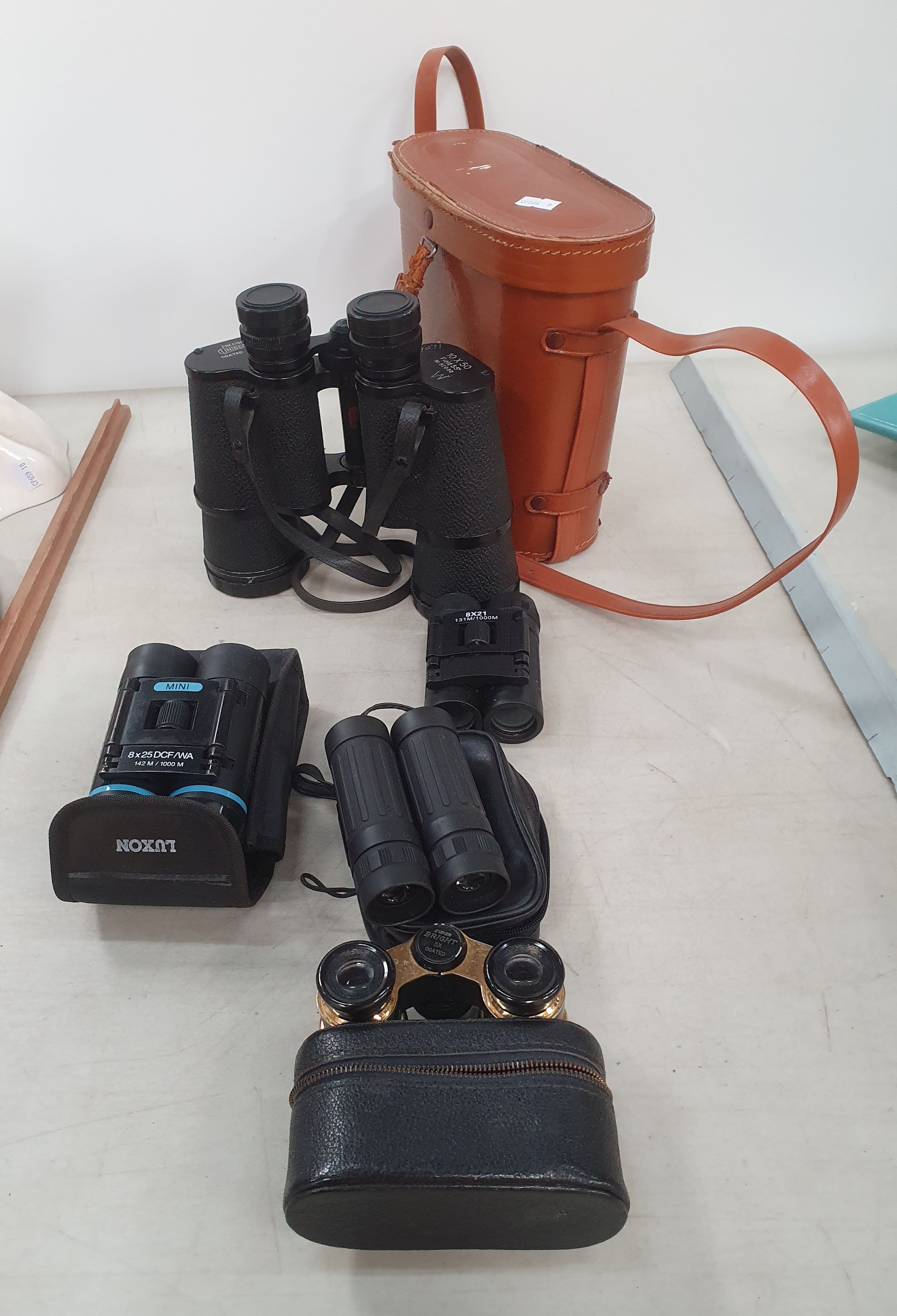 20 · FIVE PAIRS OF BINOCULARS