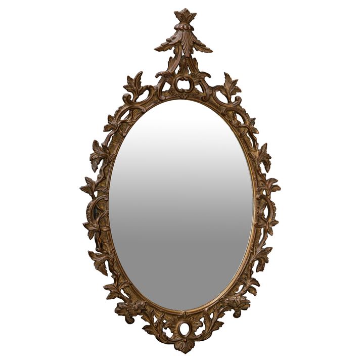 A Neoclassical style burnished giltwood oval mirror