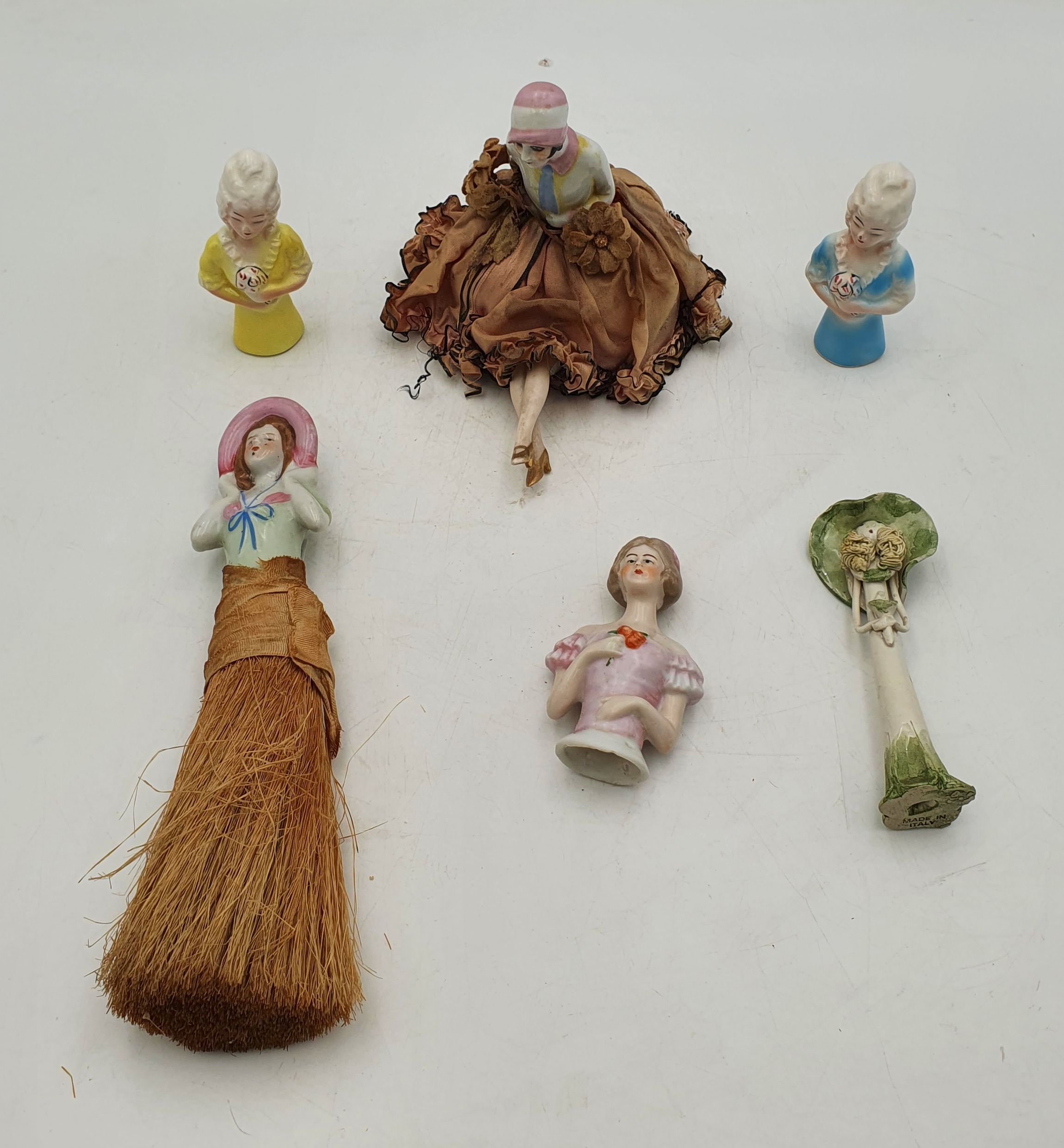 A GROUP OF HALF DOLLS