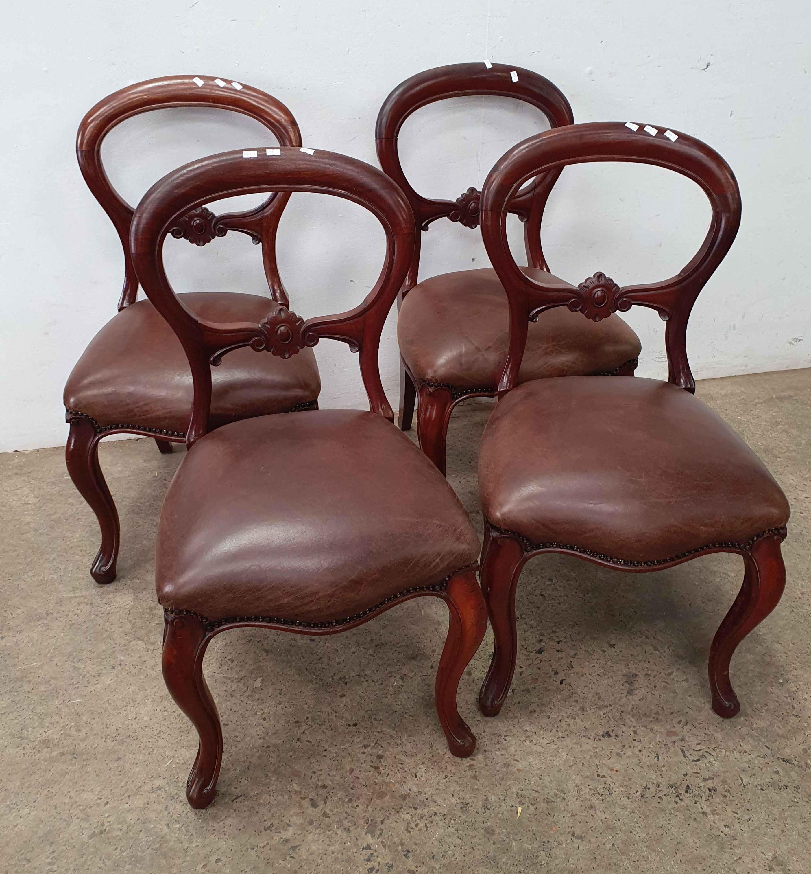 A Set Of Four Victorian Style Balloon Back Dining Chairs
