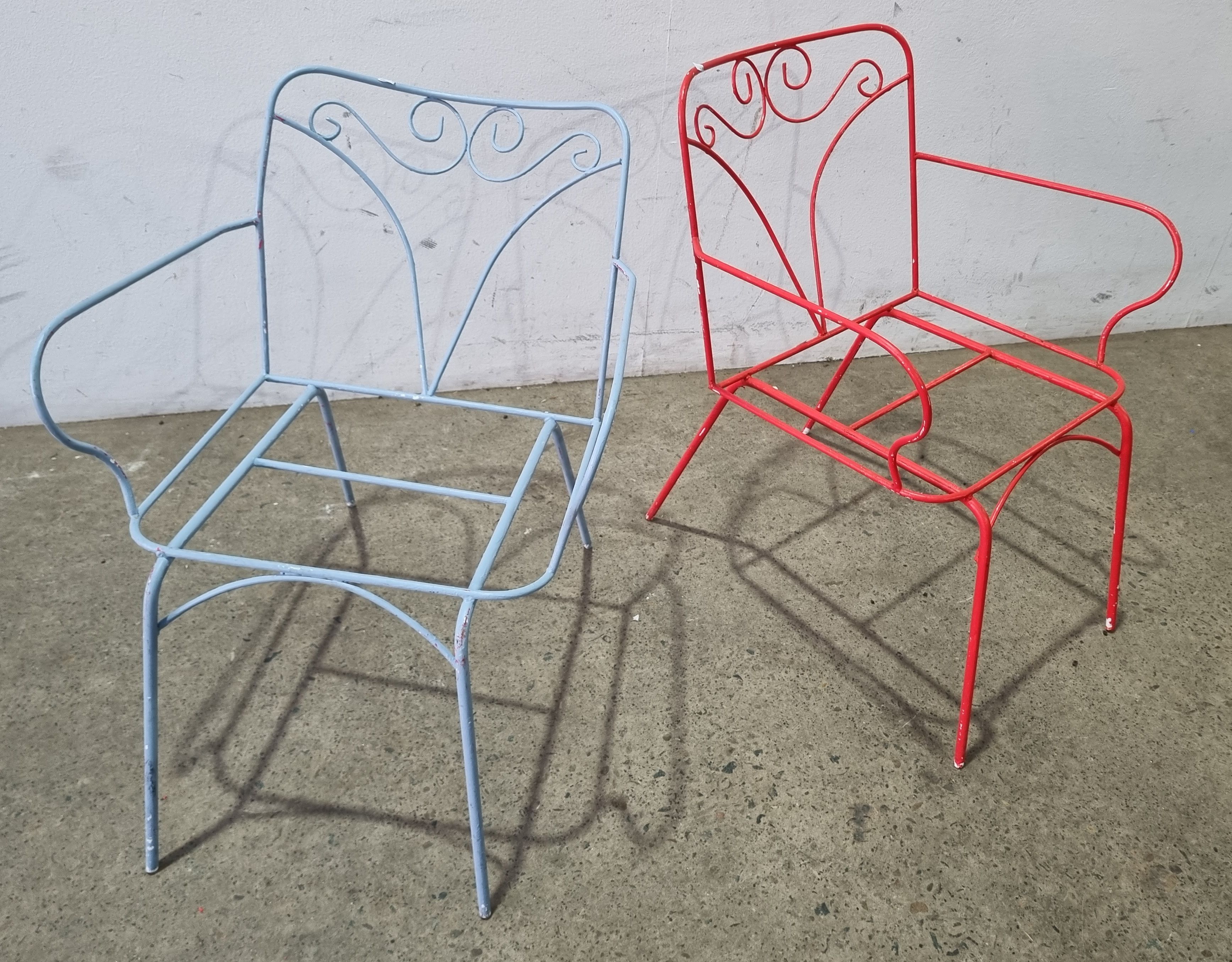 A Pair Of Blue And Red Retro Chair Frames