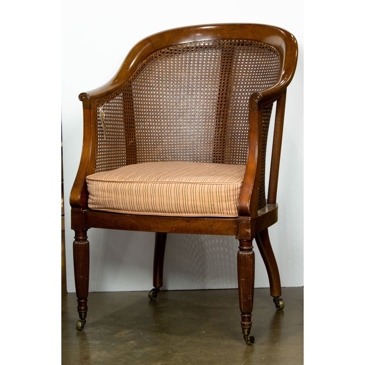 A barrel back office chair on casters