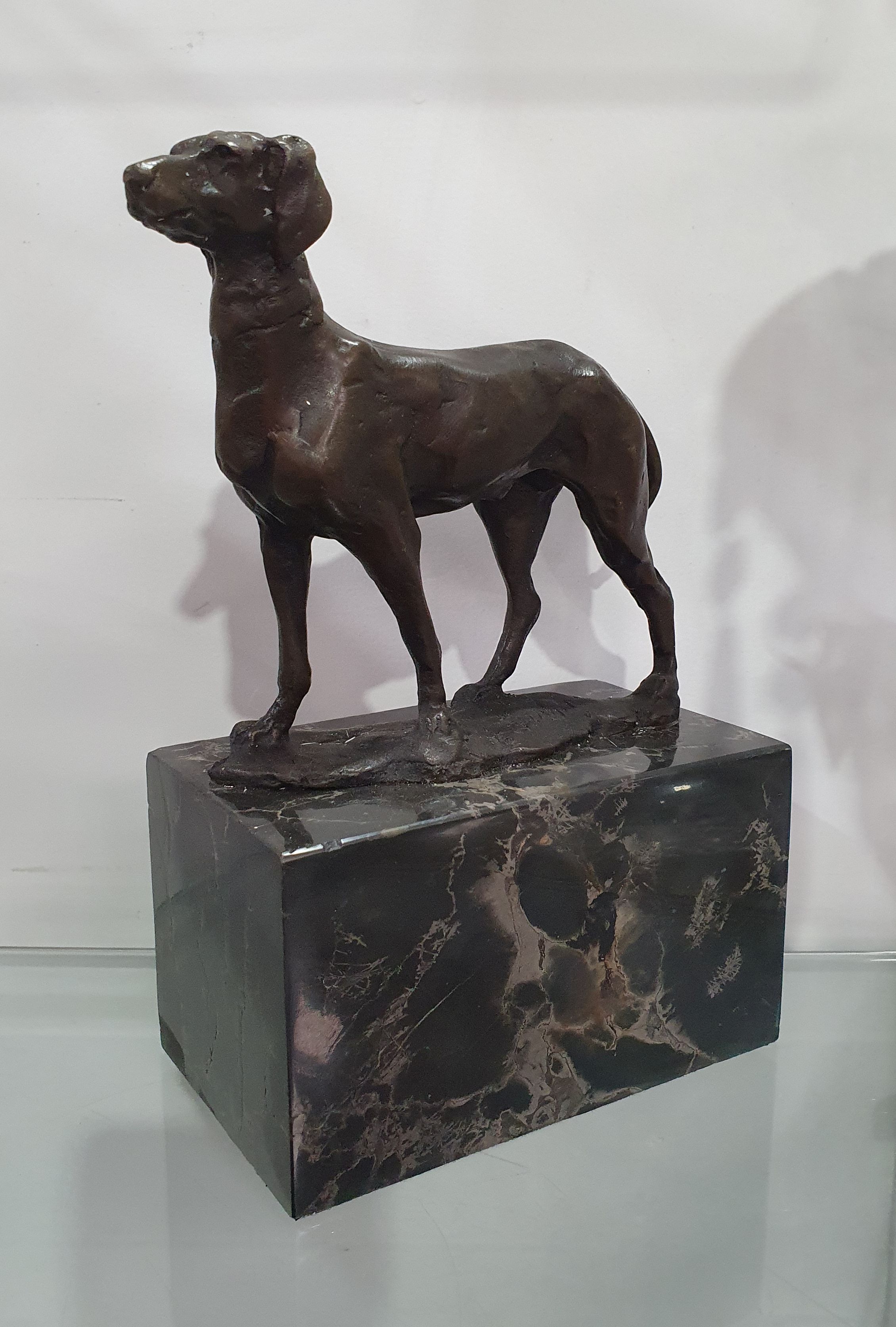 659 · A BRONZED FIGURE OF A DOG AFTER LOUIS CARVIN