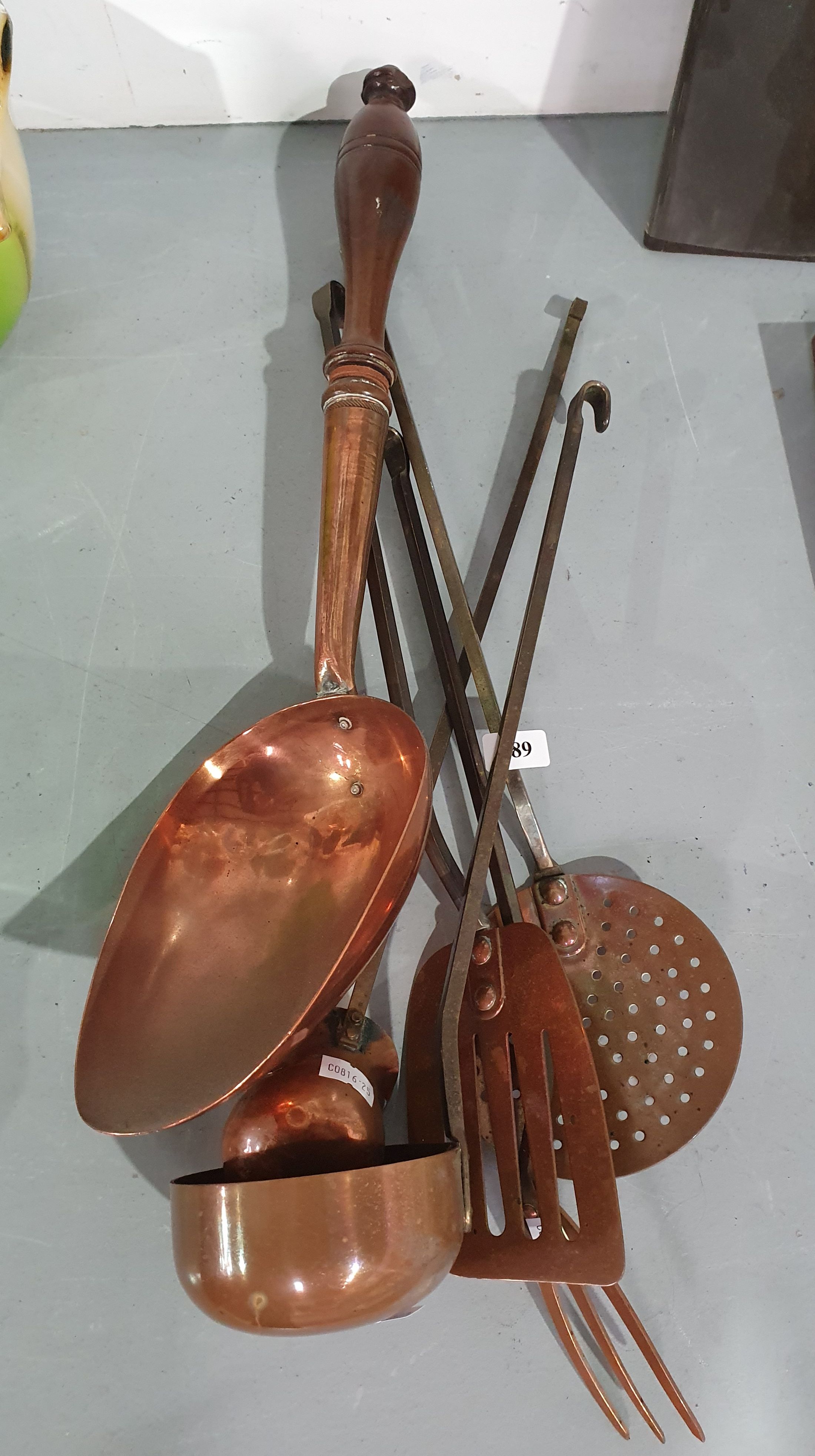 689 · FOUR KOREAN COPPER HANGING UTENSILS