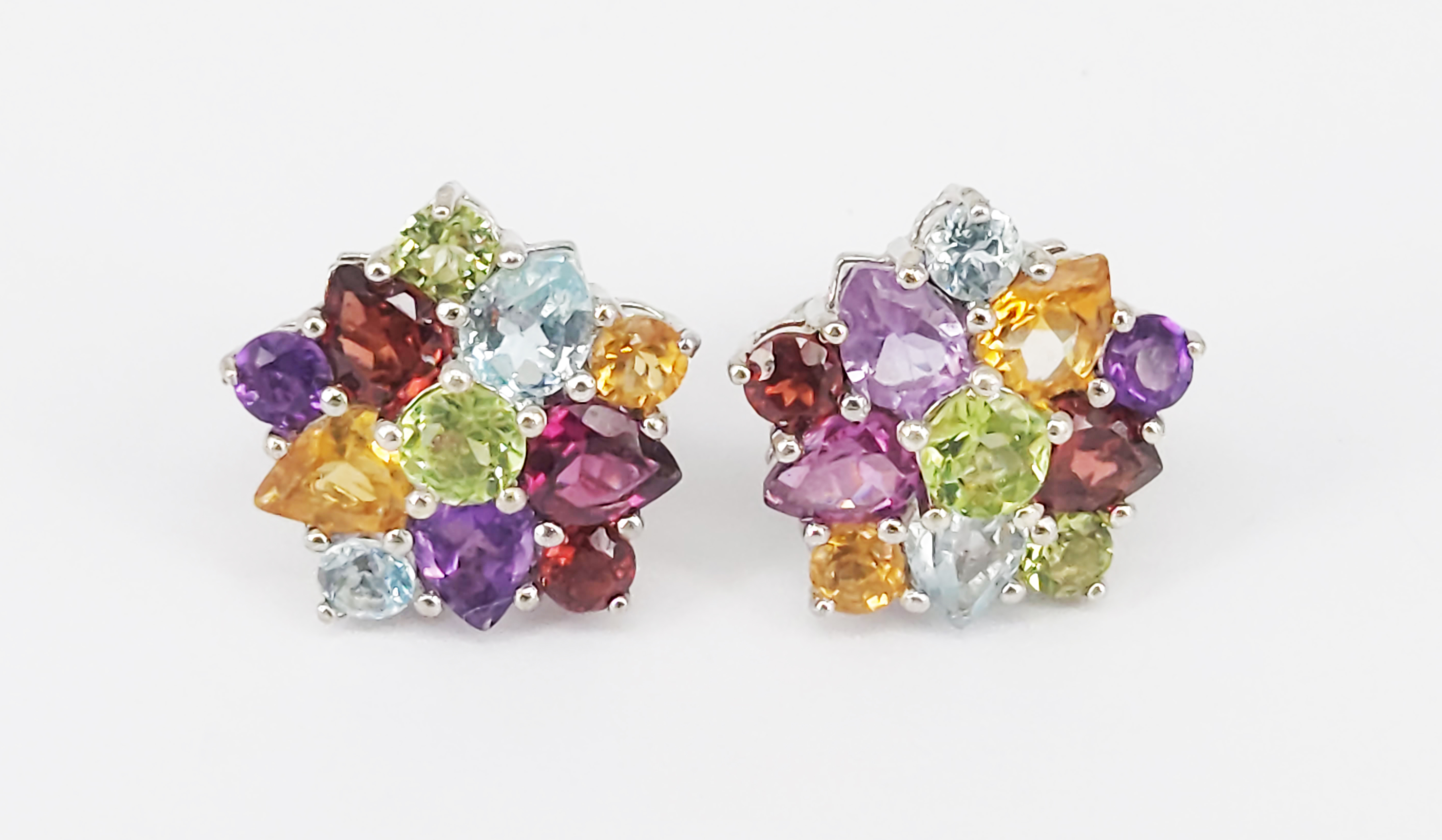 250 · A PAIR OF MULTI GEMSTONE AND SILVER FLORAL CLUSTER EARRINGS