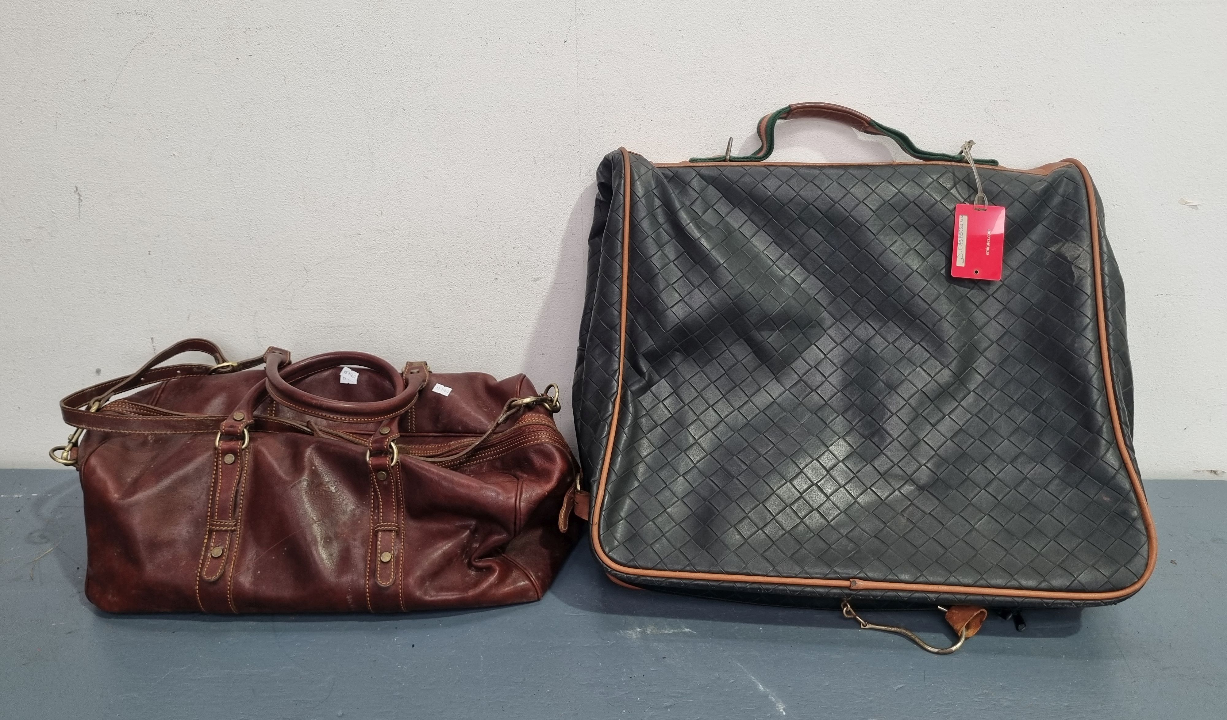 Two Men'S Leather Travel Bags