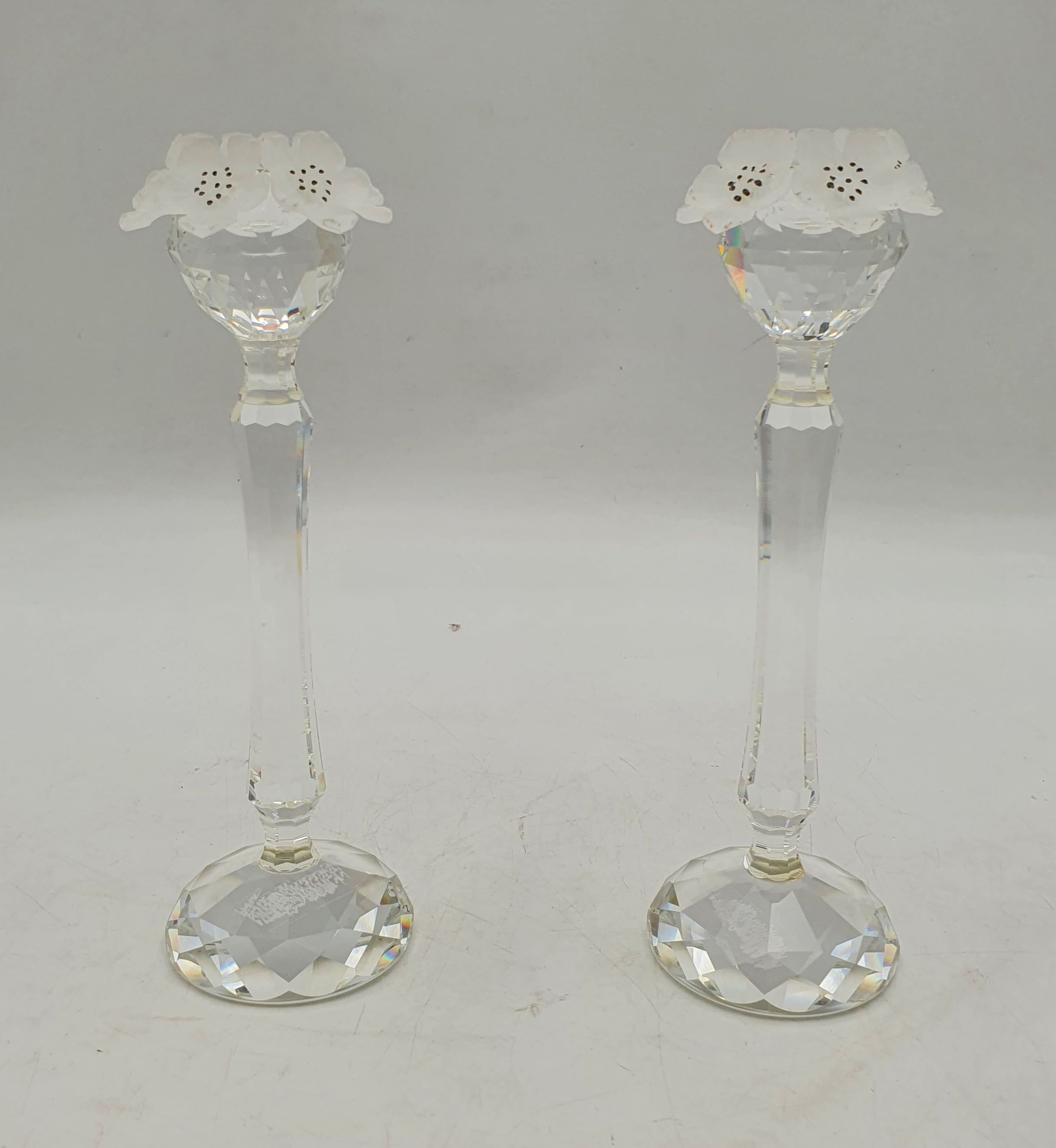 A Pair Of Swarovski Crystal Flower Topped Candleholders