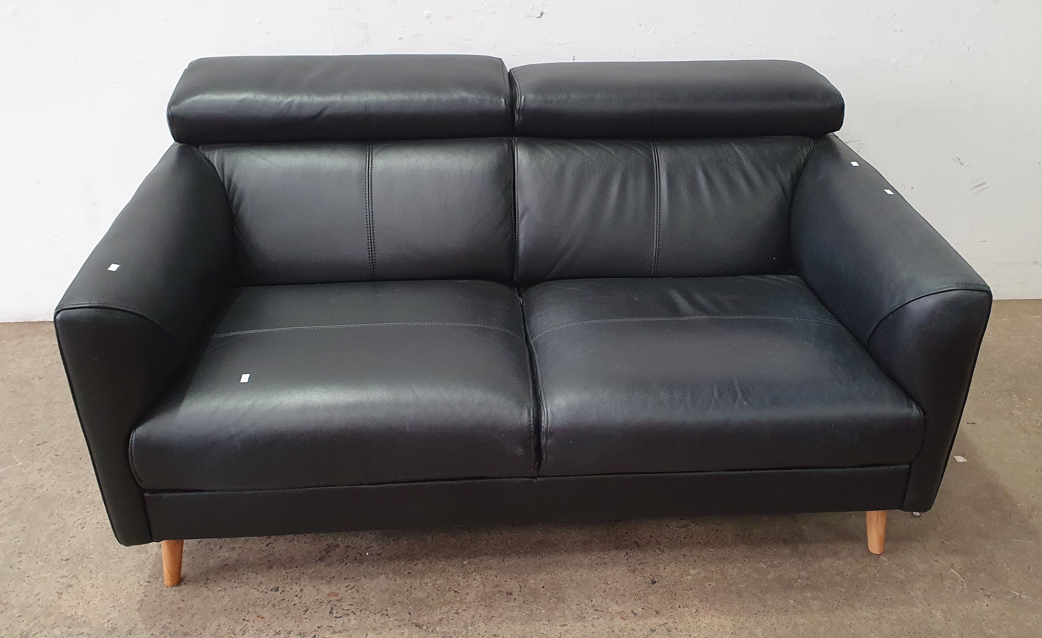 A Leather Two Seater Lounge