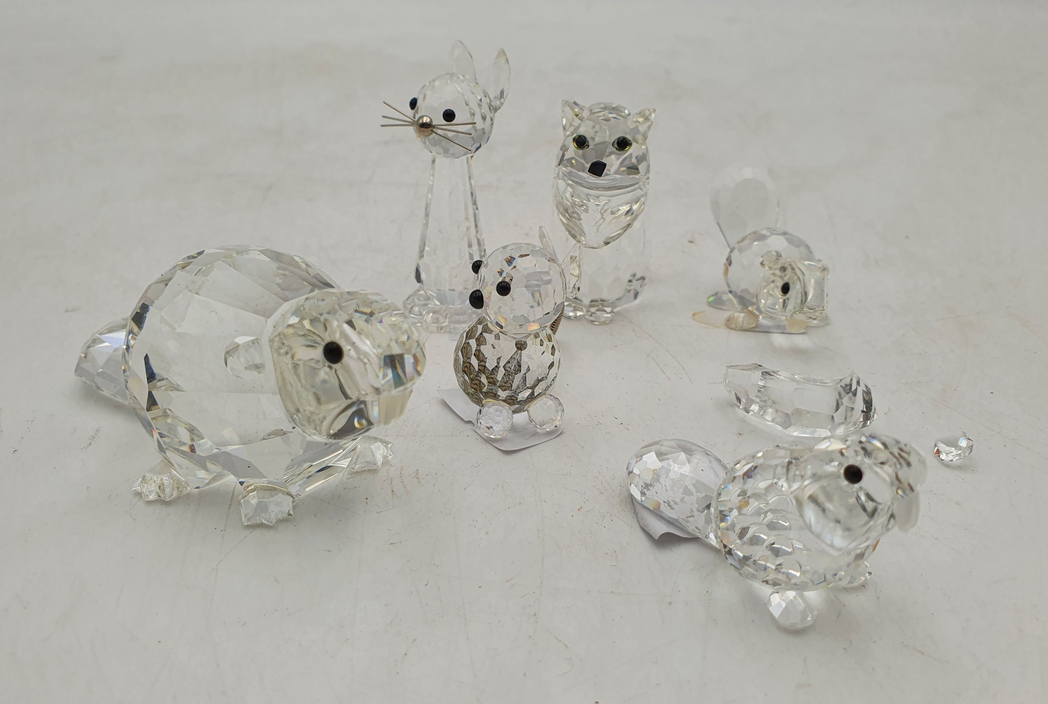Three Swarovski Crystal Cat Figures And Three Beavers