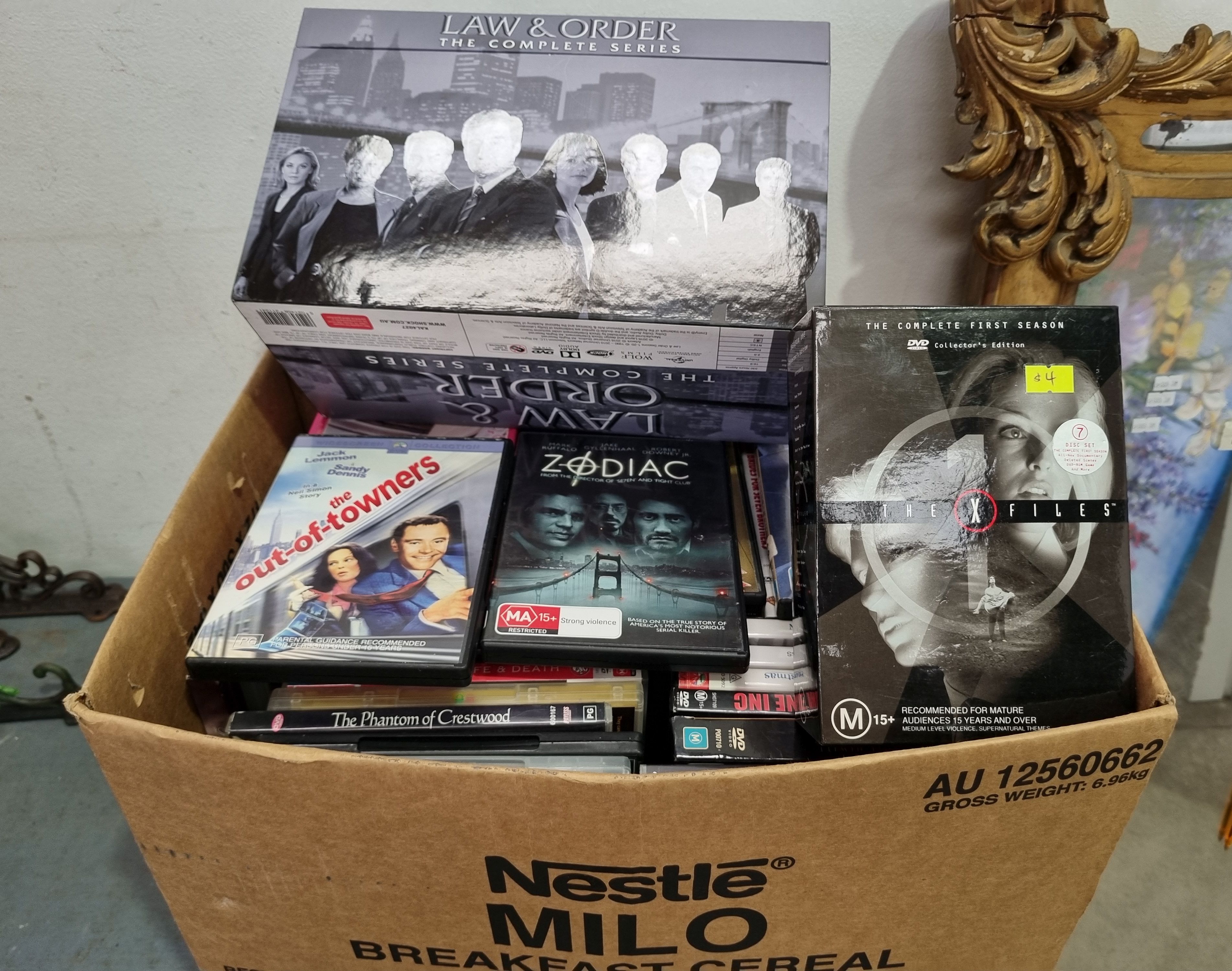 A BOX OF DVDS