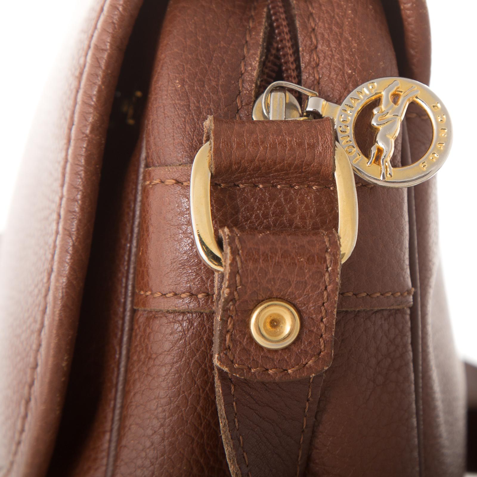Sold at Auction: Vintage Longchamp Brown Leather Purse