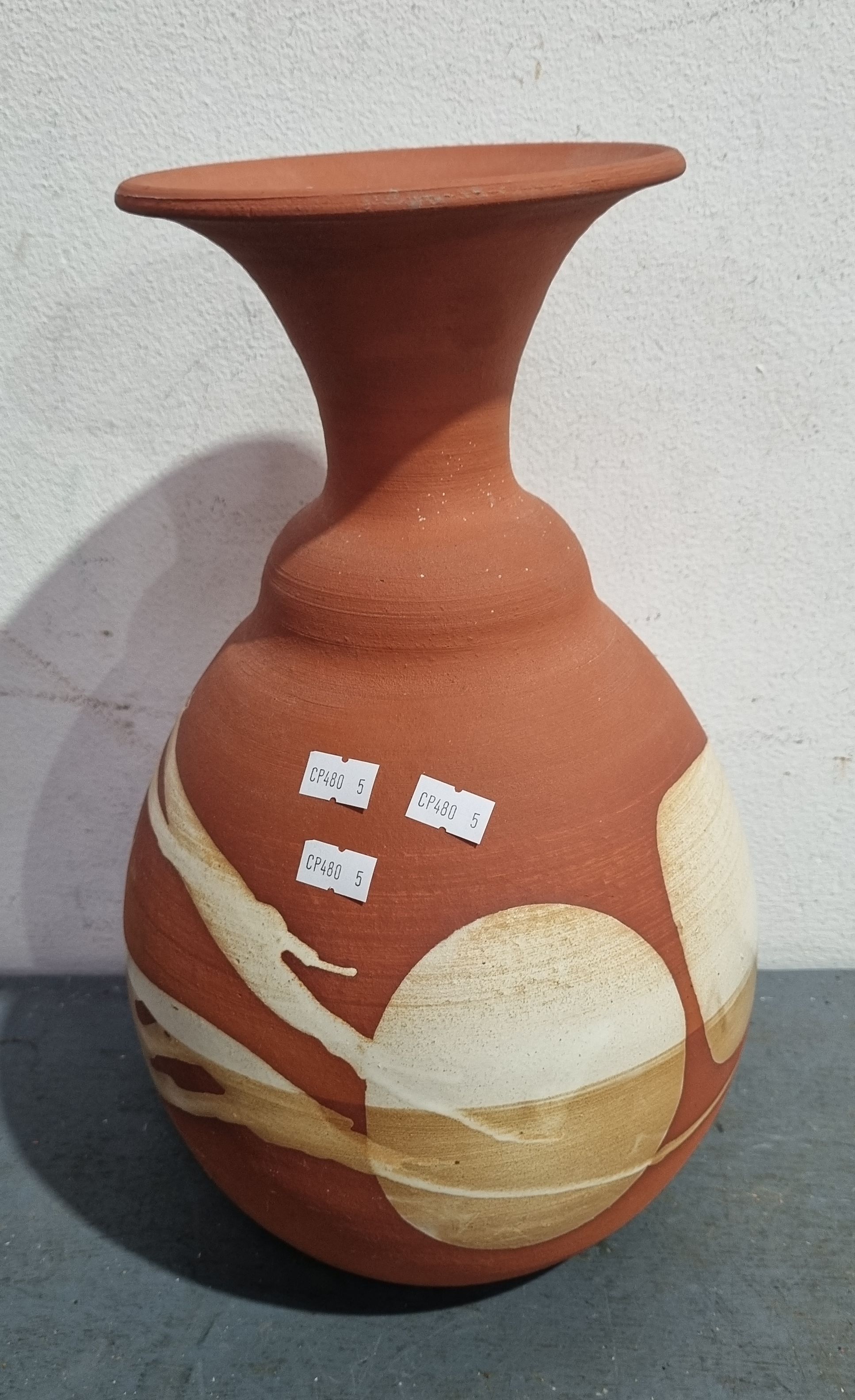 1154 · A TERRACOTTA VASE