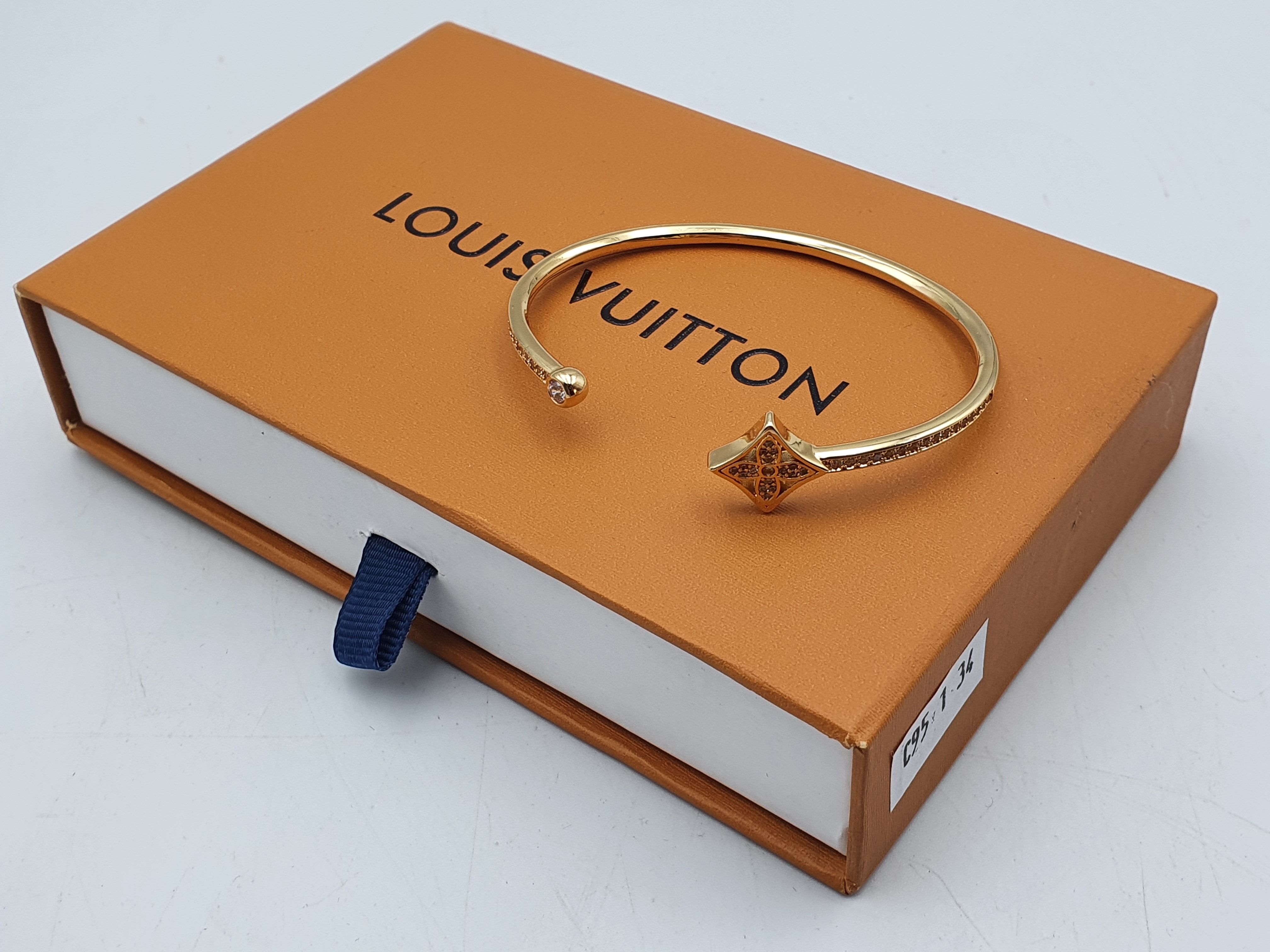299 · A GOLD PLATED CUFF BANGLE
