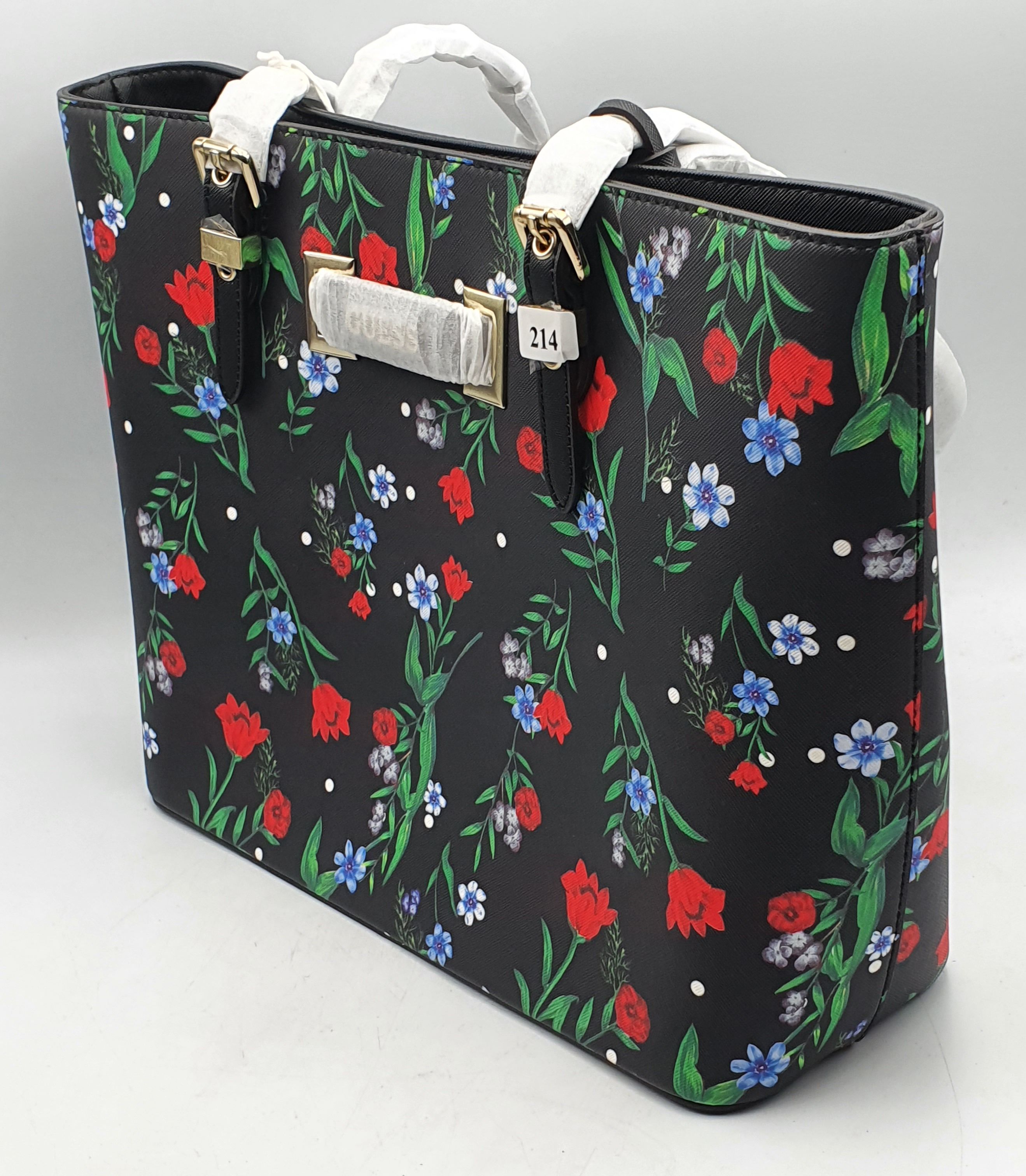 214 · A LADIES GUESS BAG