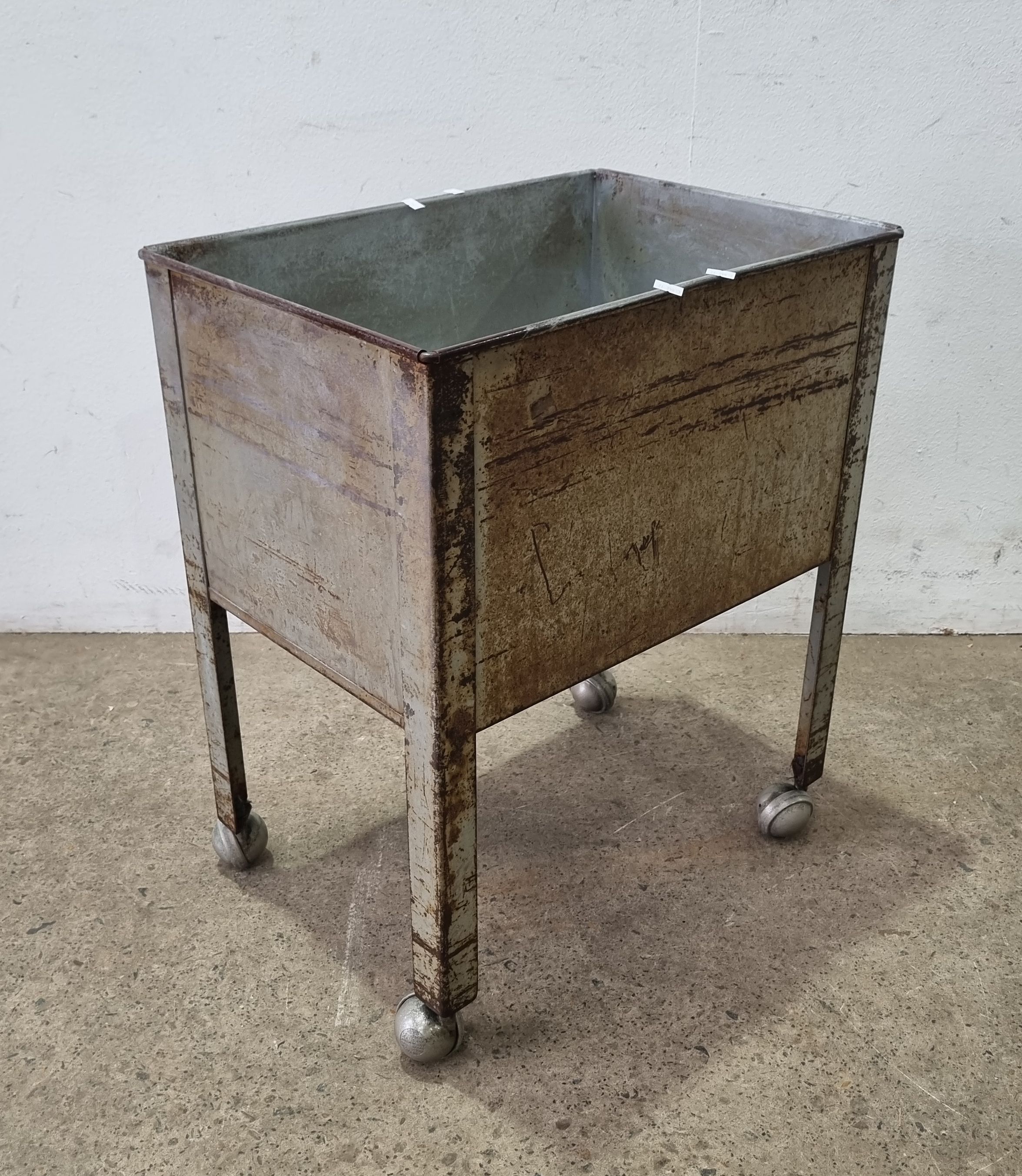 A Metal Container On Wheels
