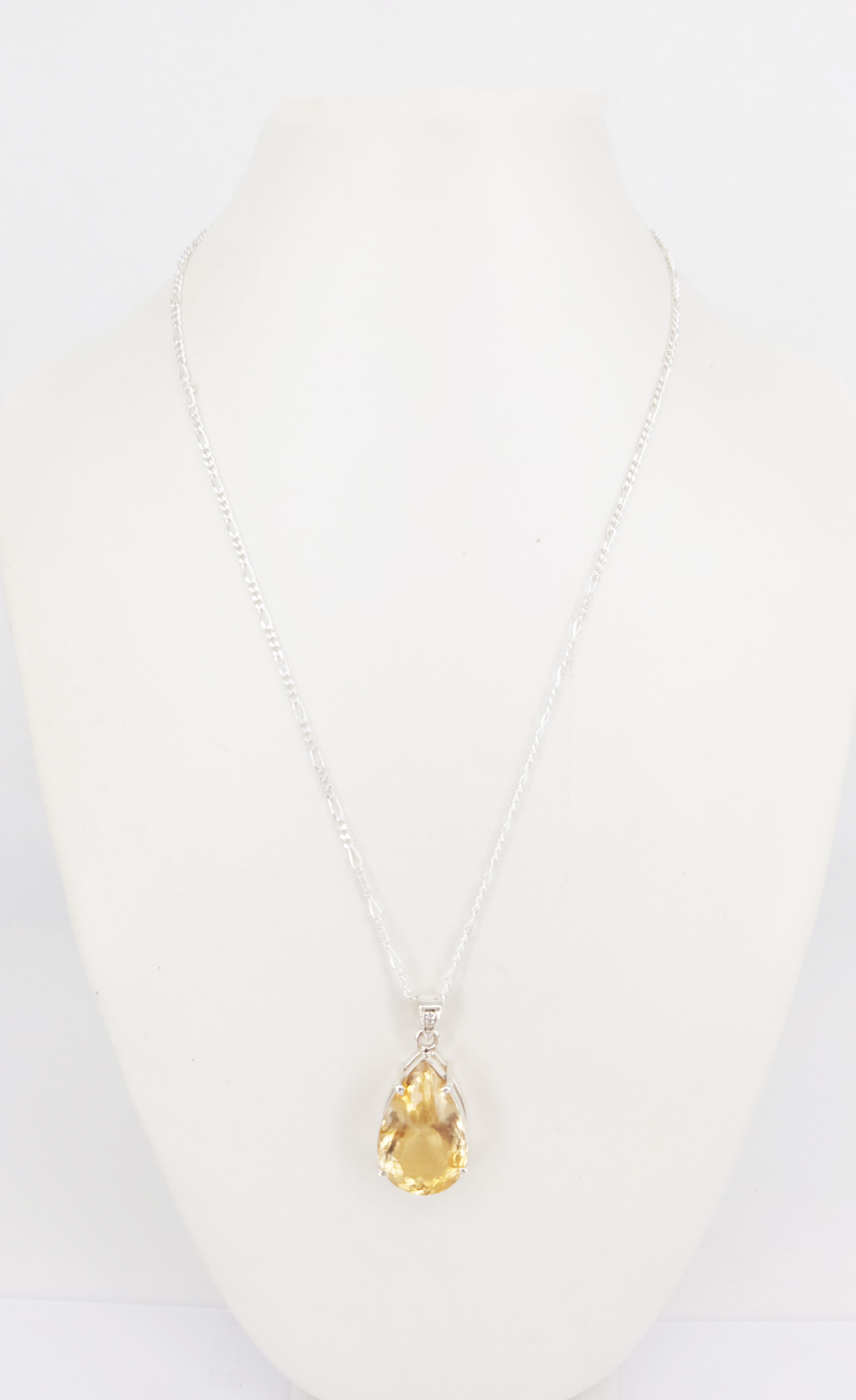 A Silver And Pear Shaped Citrine Pendant Necklace