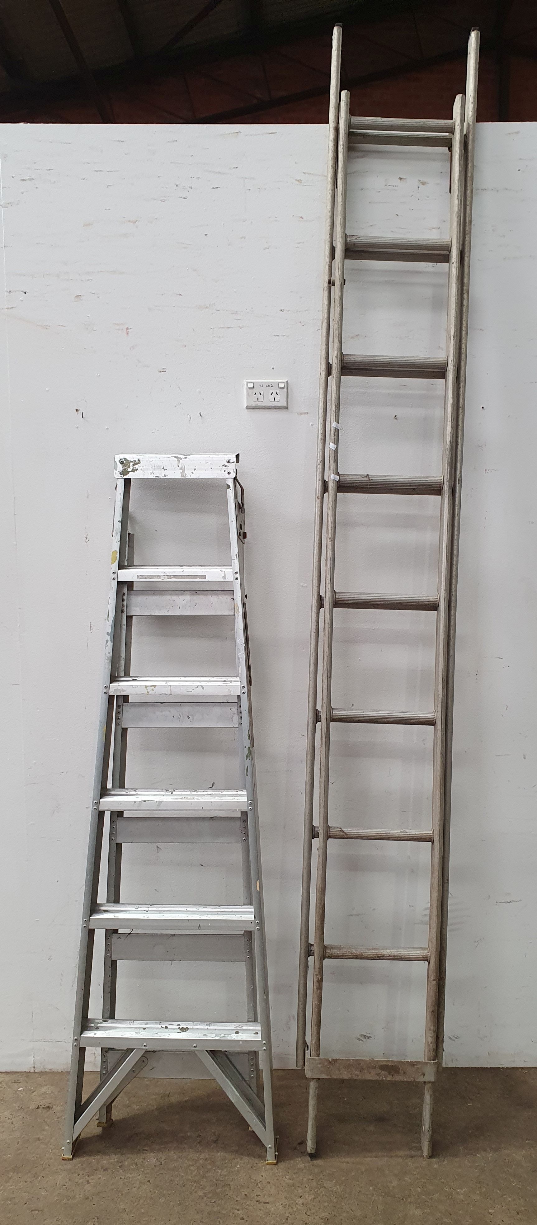 1107 · TWO ALUMINIUM LADDERS