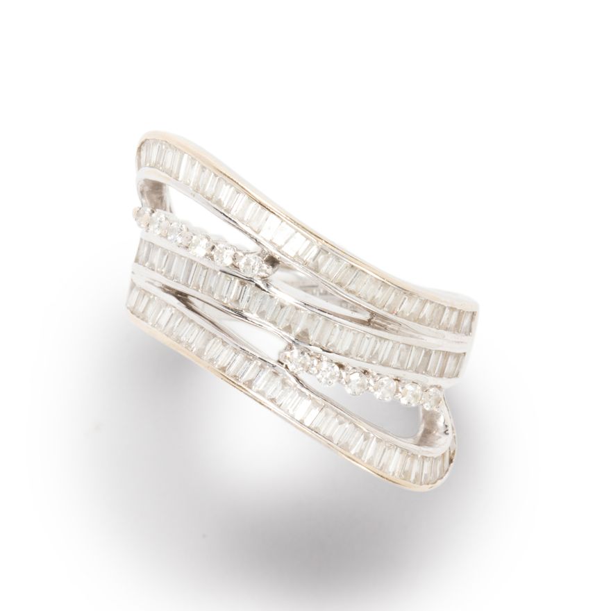 A diamond and eighteen karat white gold ring