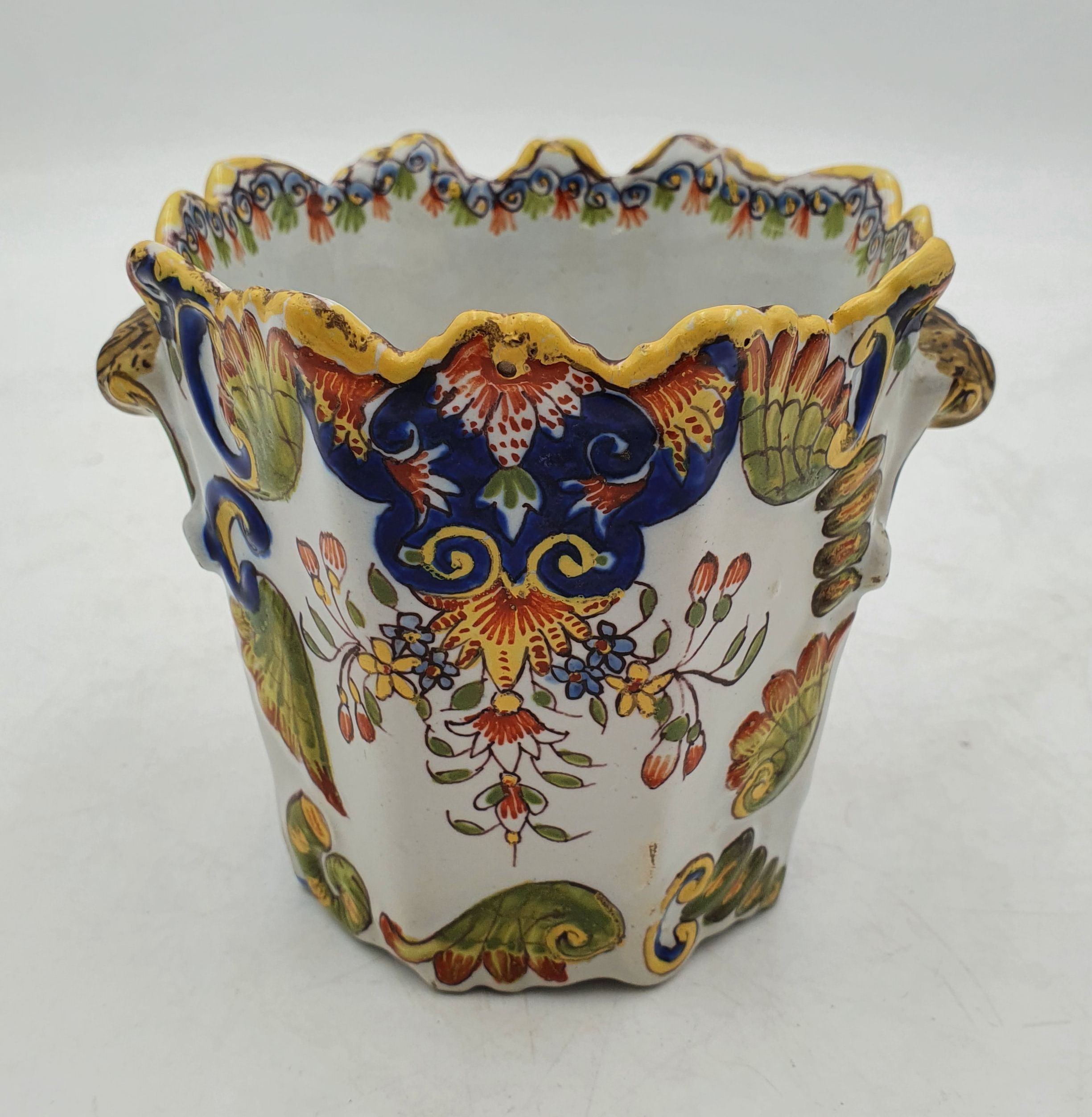 511 · A FRENCH FAIENCE CACHE POT