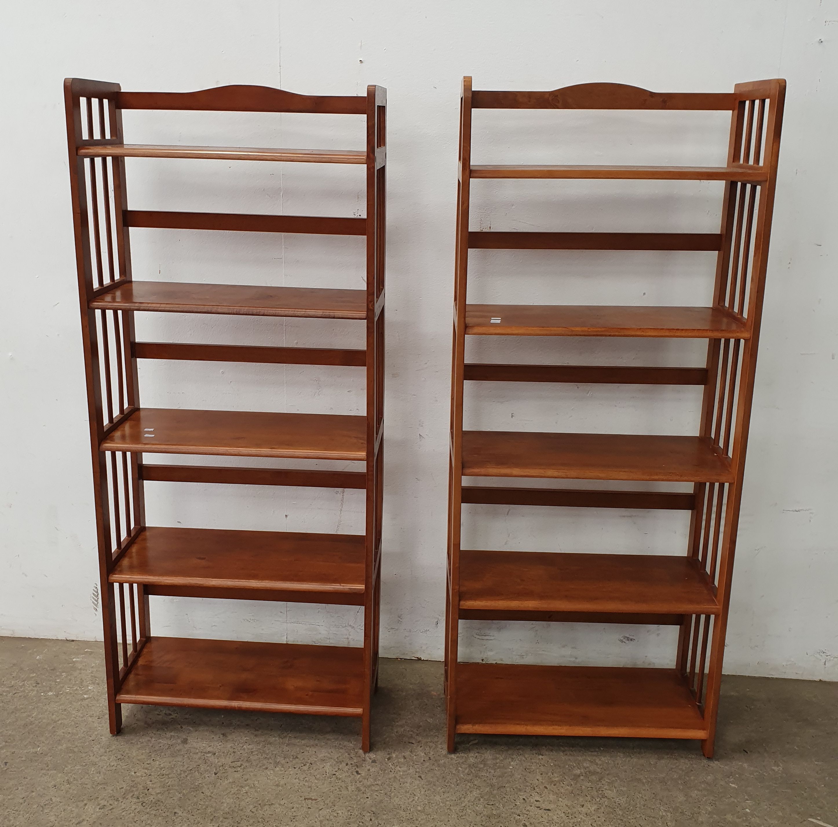 A Pair Of Wooden Bookcases