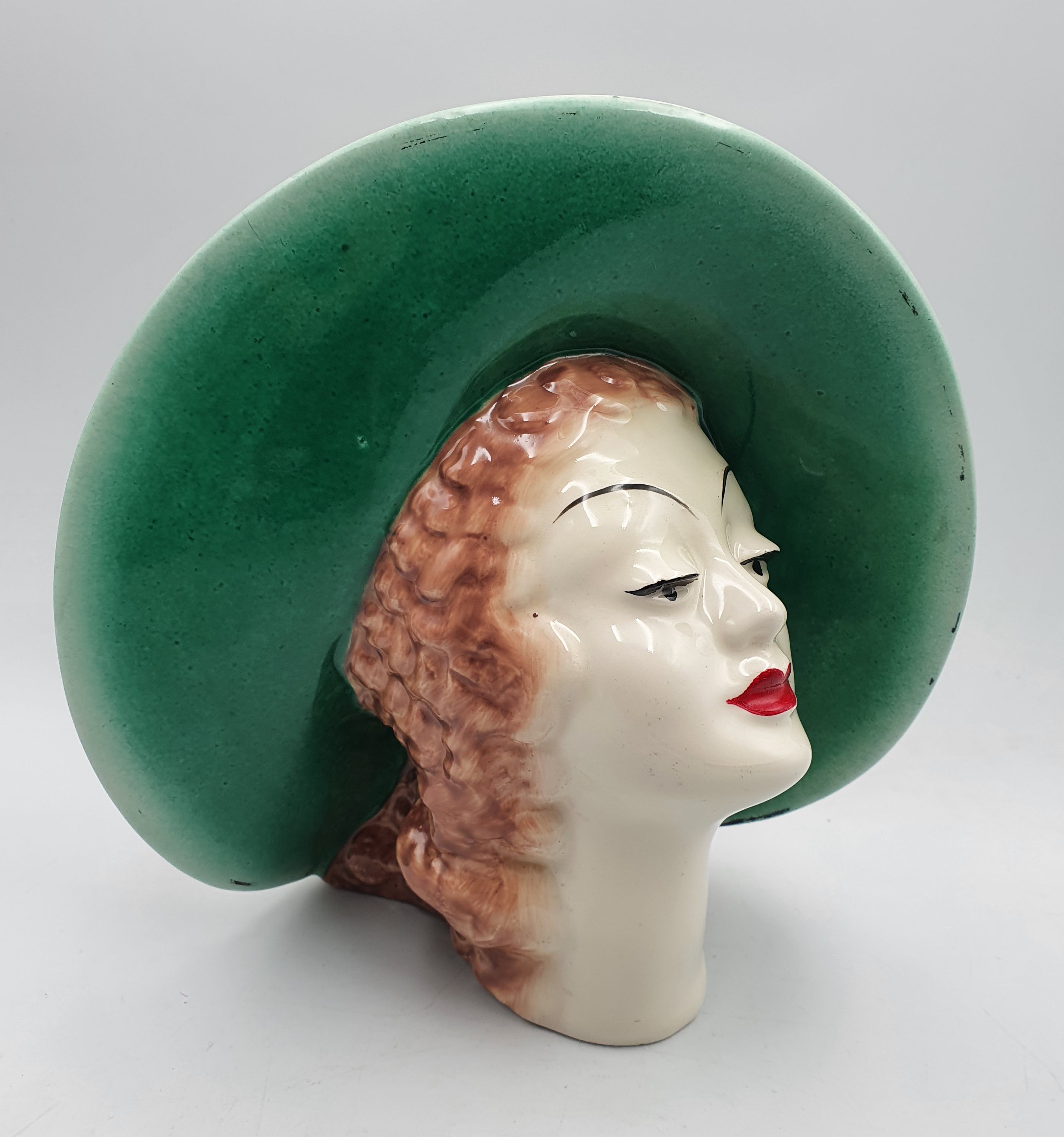 216 · A CLARICE CLIFF LADY HEAD VASE