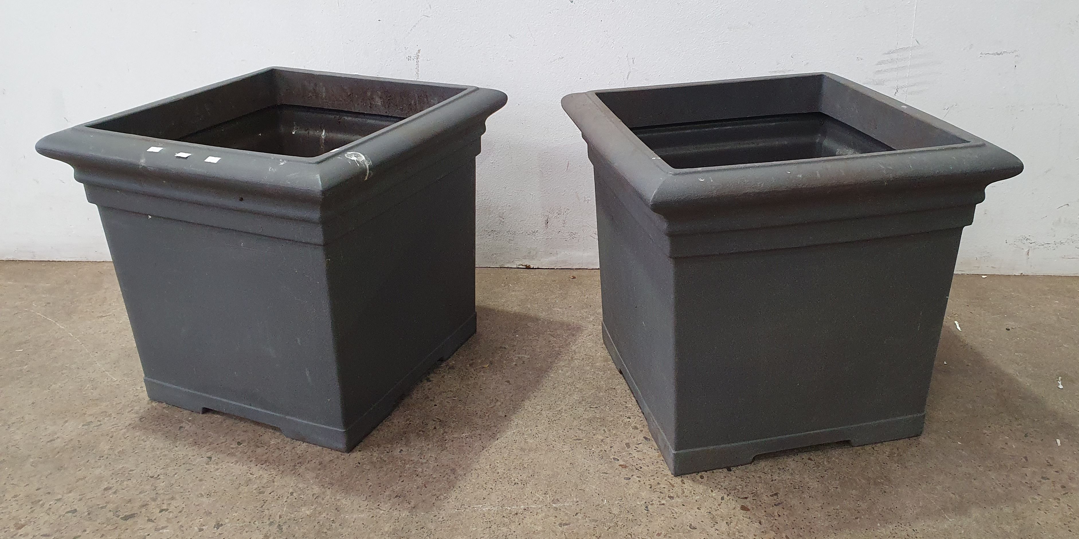 1126 · A PAIR OF FIBERGLASS POTS