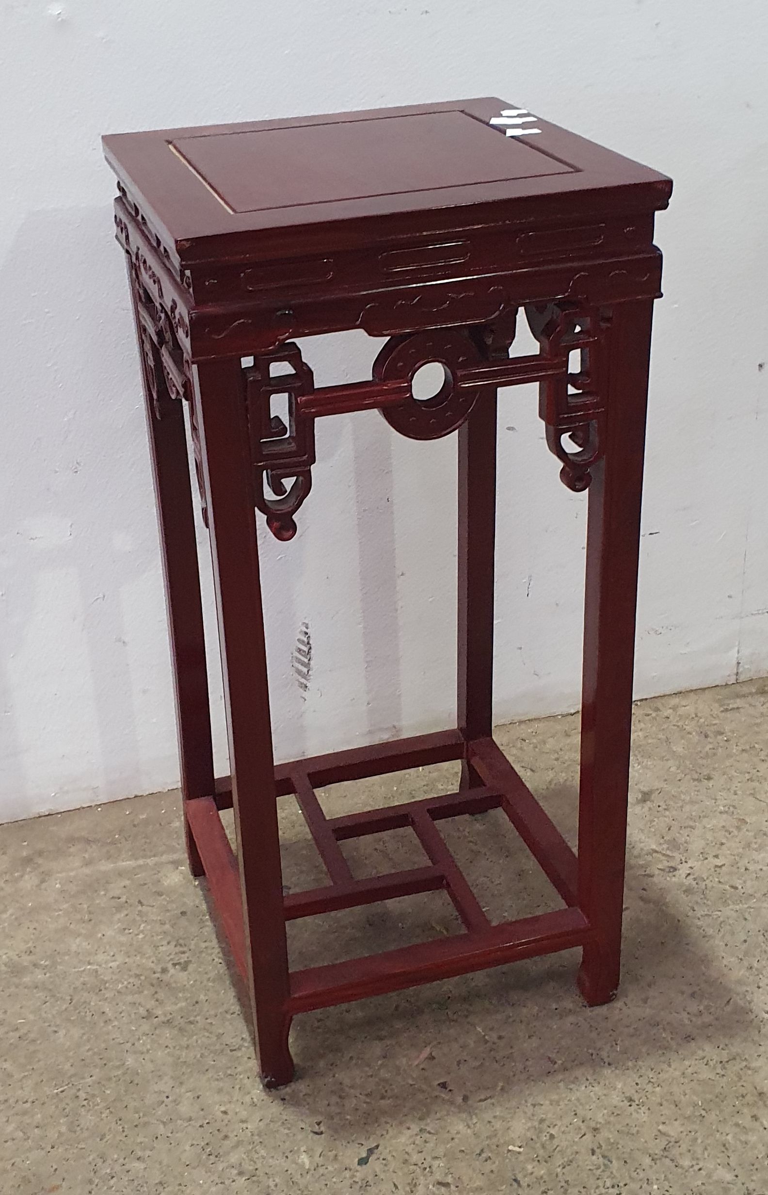 2065 · A CHINESE CARVED HARDWOOD JARDINIERE PEDESTAL