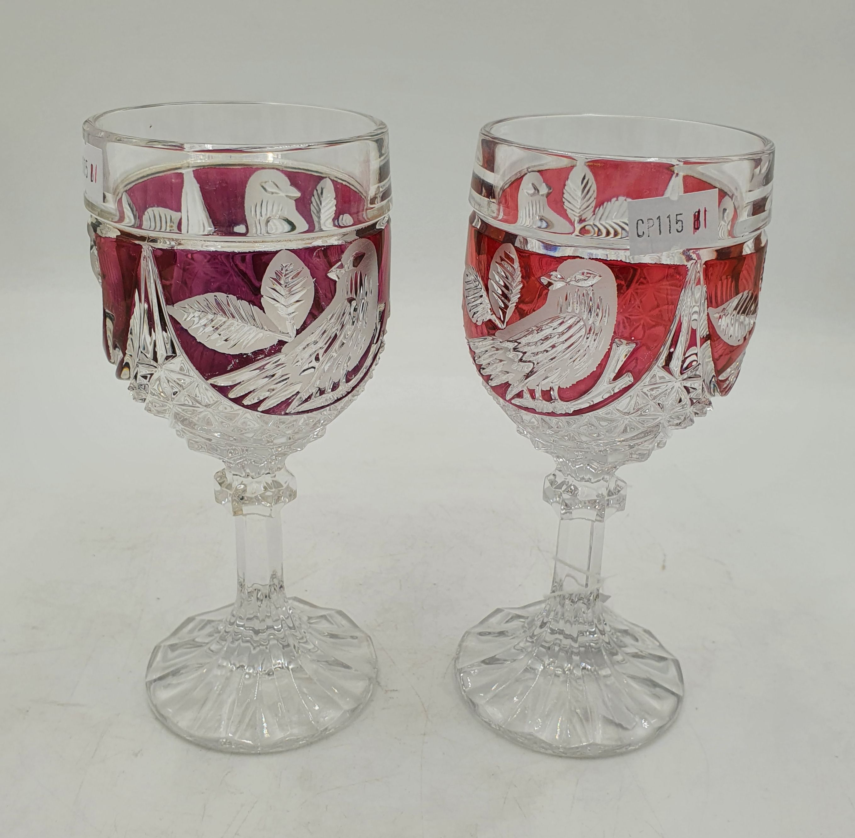 592 · A PAIR OF HOFBAUER CUT TO CLEAR CRYSTAL WINE GLASSES