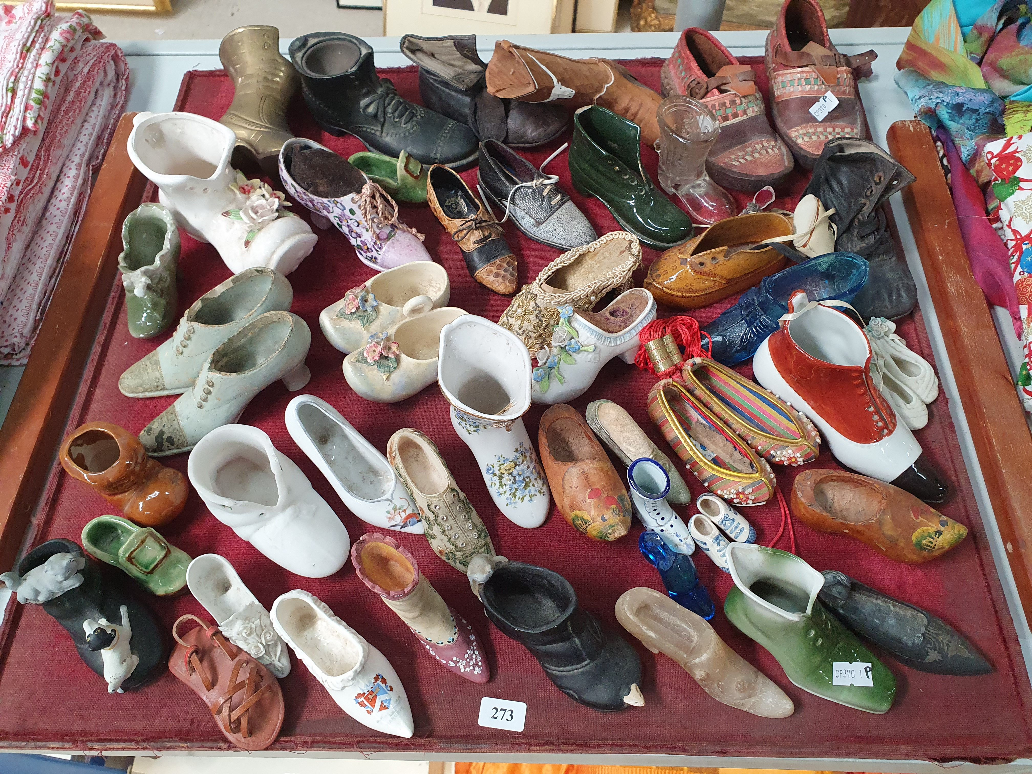 A COLLECTION OF SHOES AND BOOTS