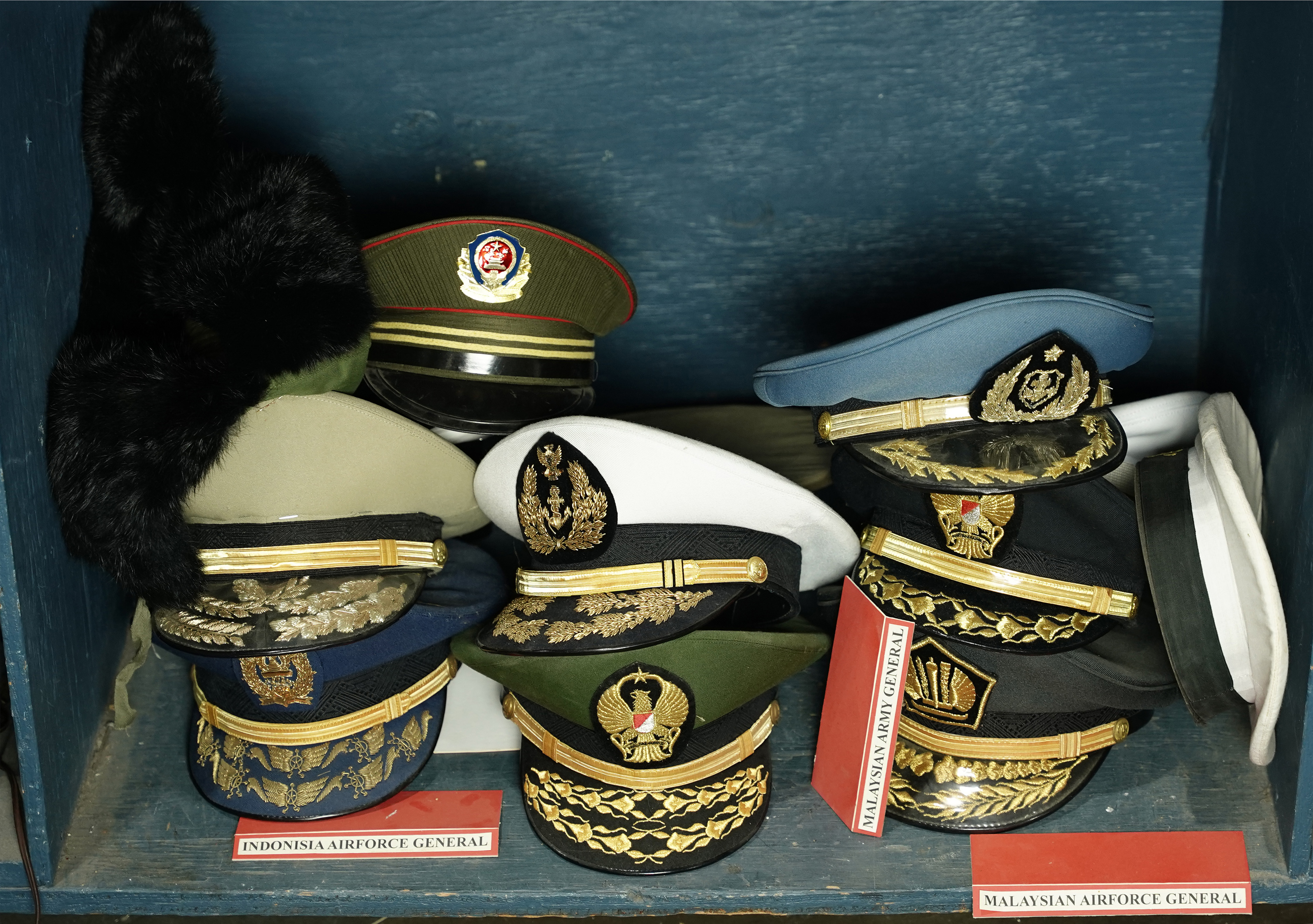 Asian military hats | Clars Auction 