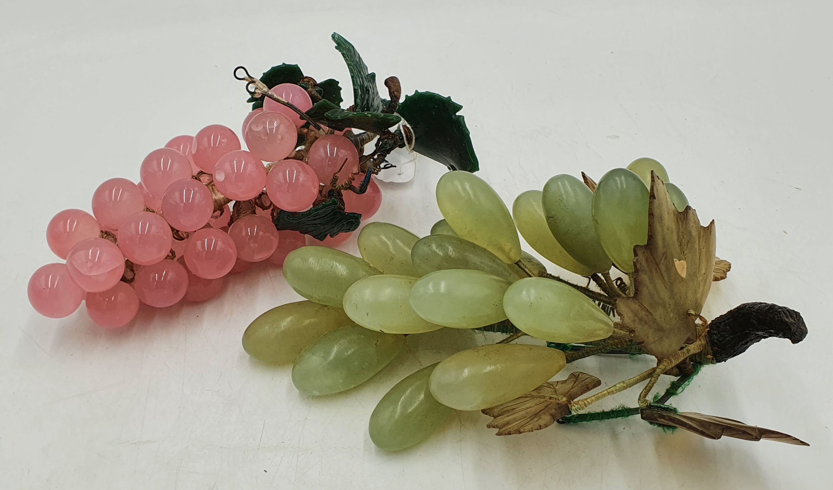 626 · TWO CLUSTERS OF GLASS GRAPES