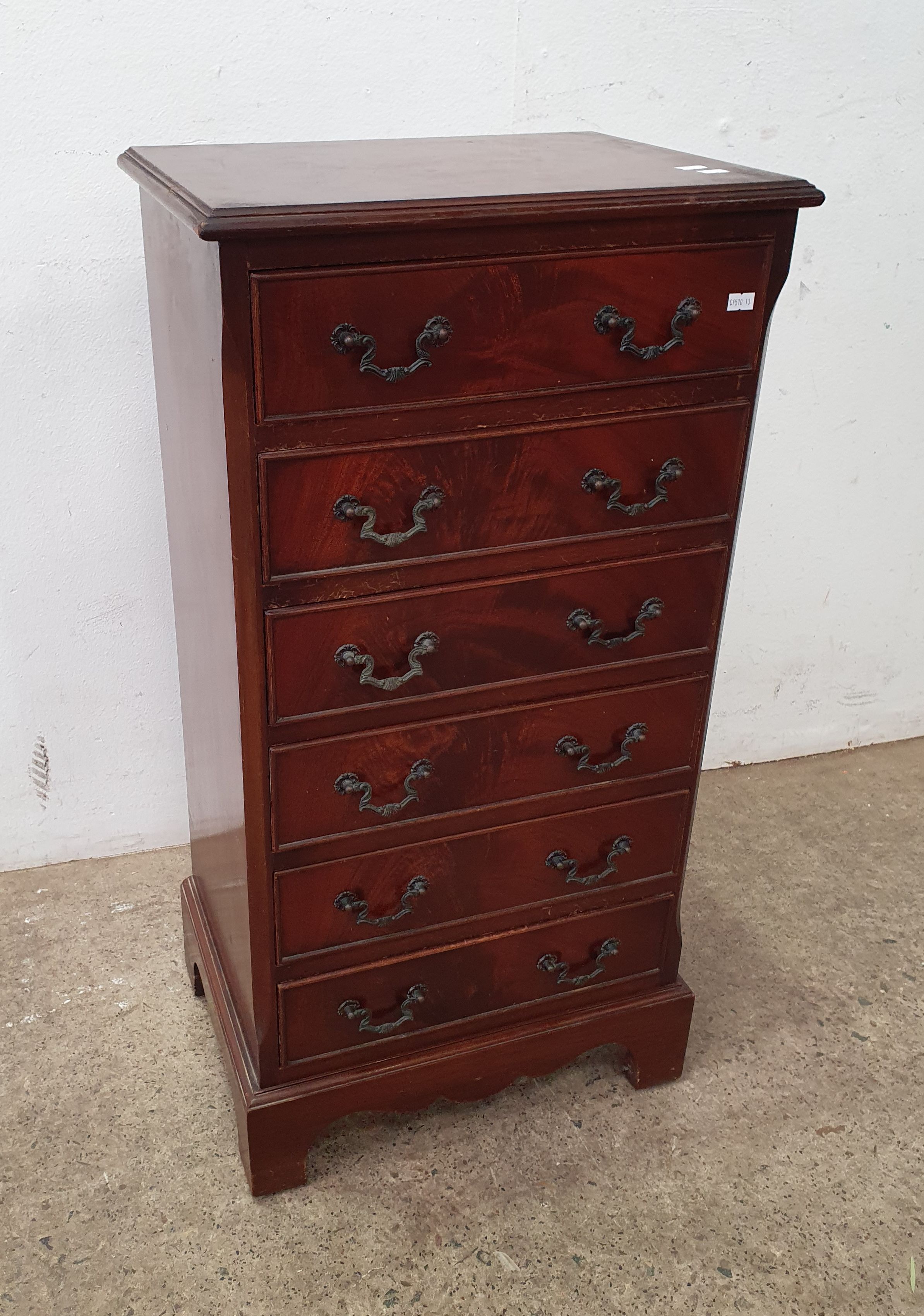 A Mahogany Bedside Chest Of Six Drawers