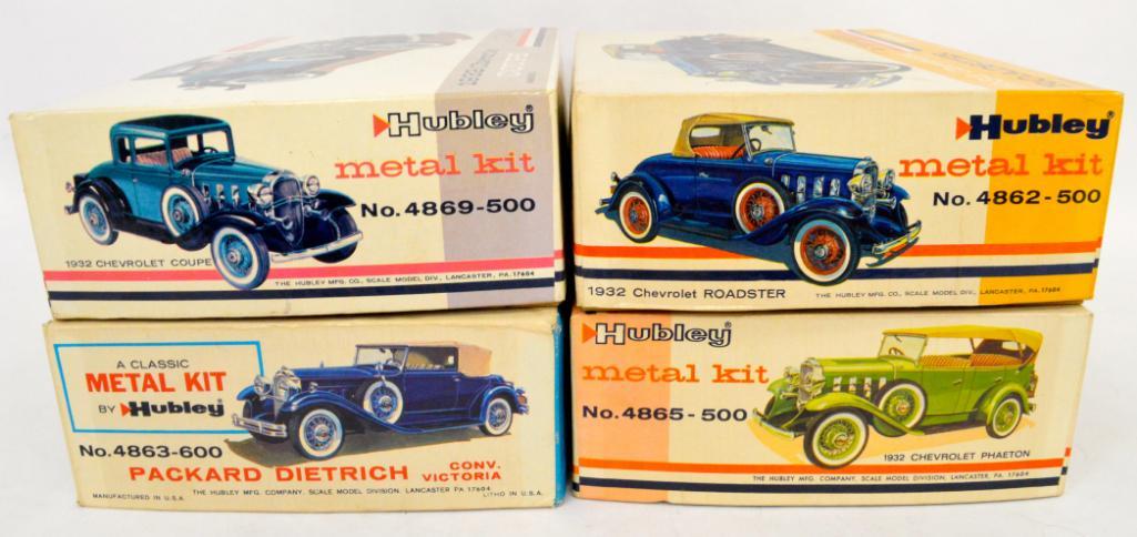 Four unbuilt vintage Hubley die cast metal model kits in OBs