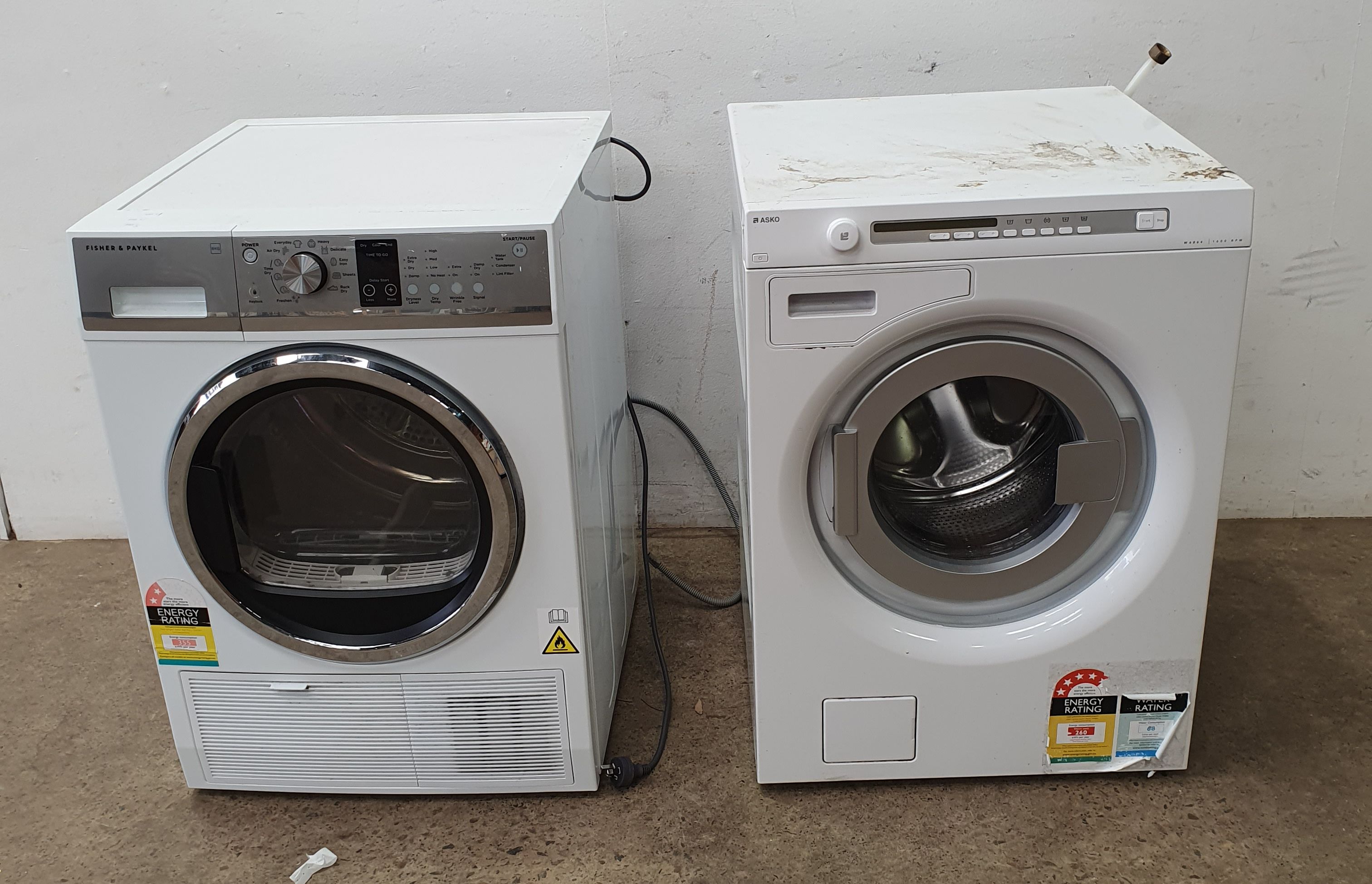 An Asko Washer With A Fisher Paykel Dryer
