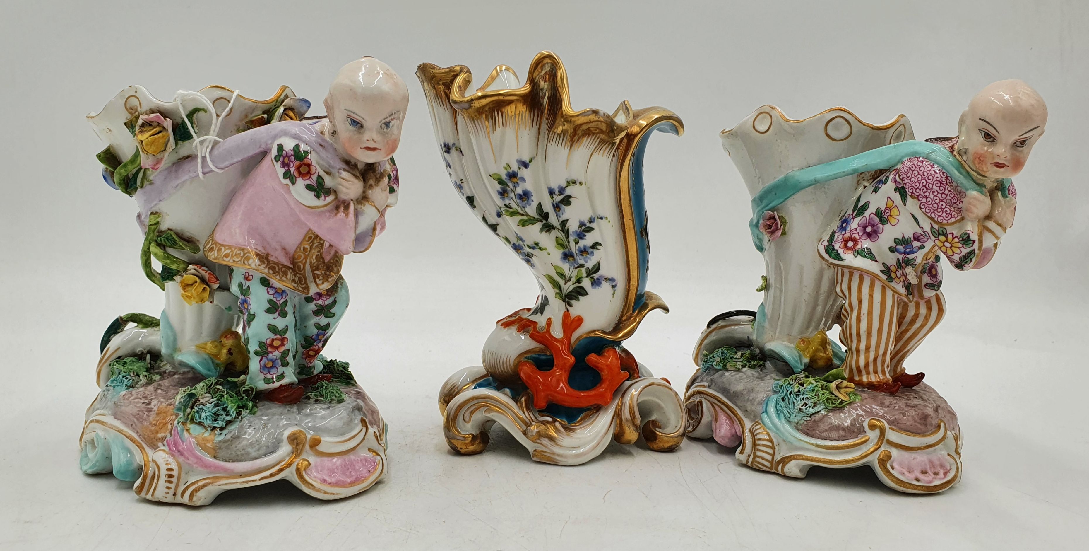 A Pair Of 19th Century German Figural Vases