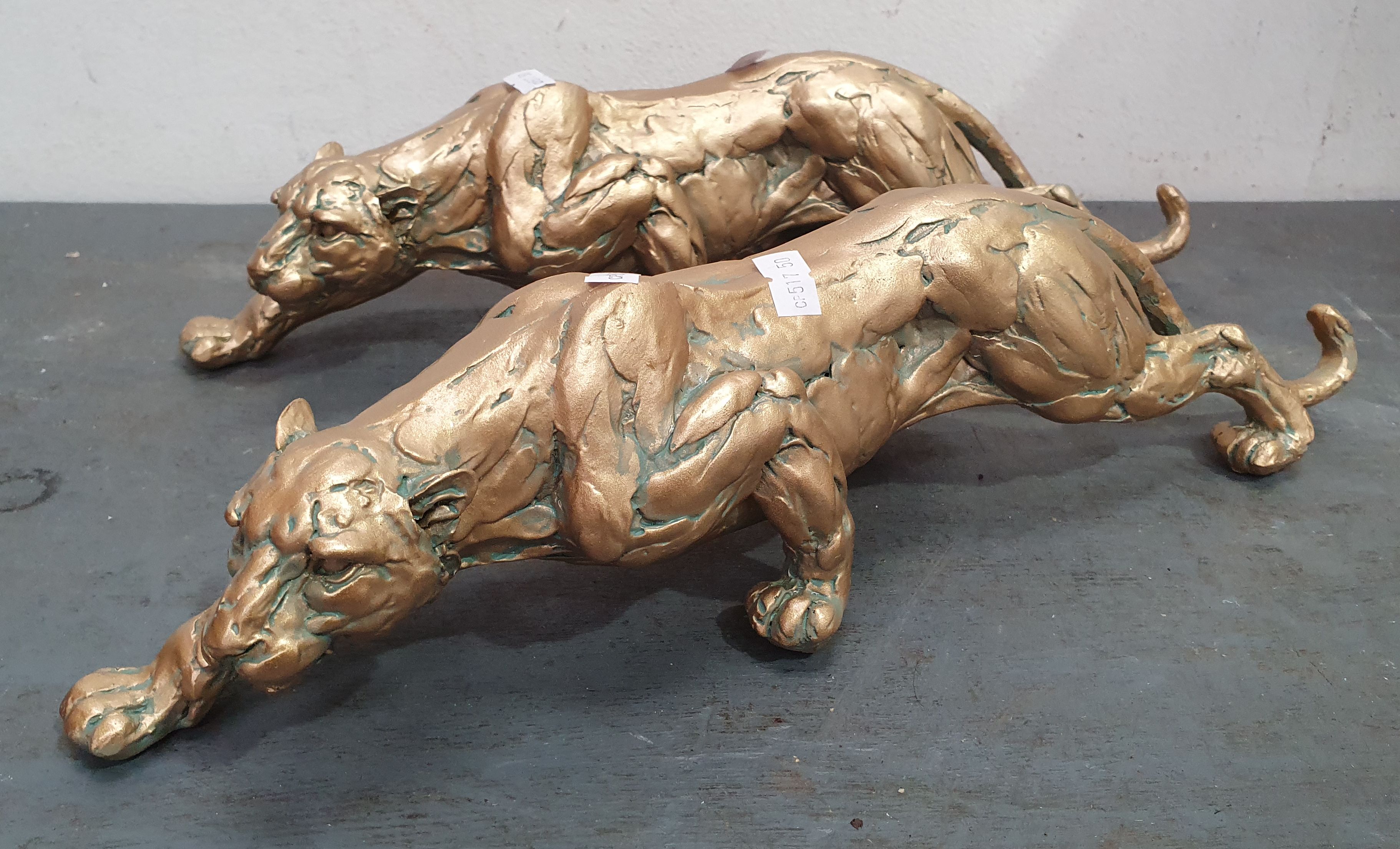 A Pair Of Resin Panthers