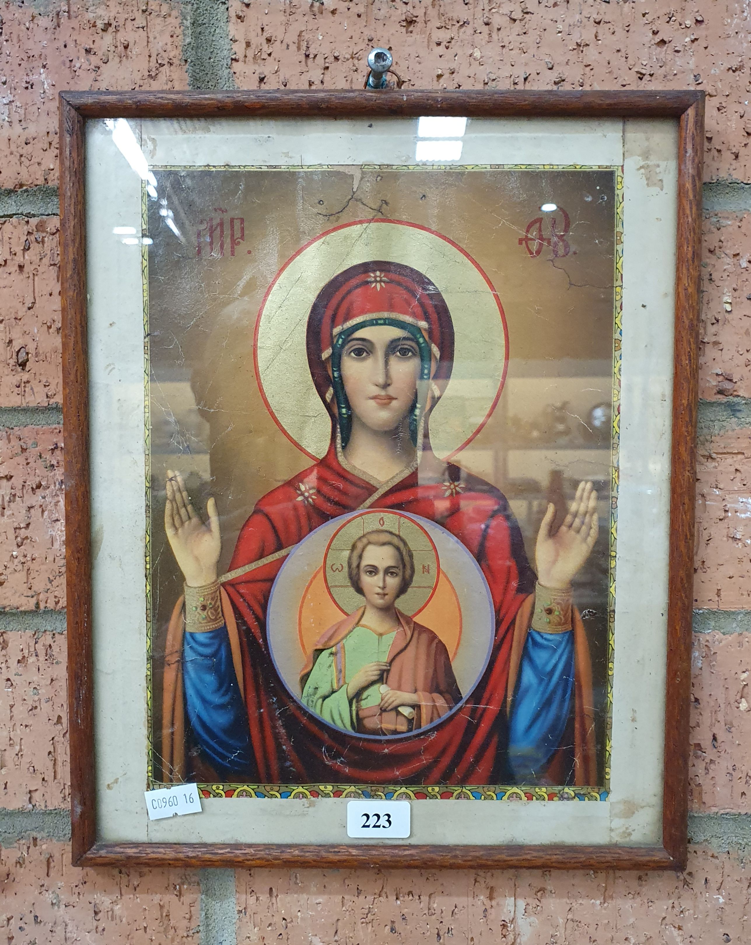 223 · A FRAMED RELIGIOUS PRINT