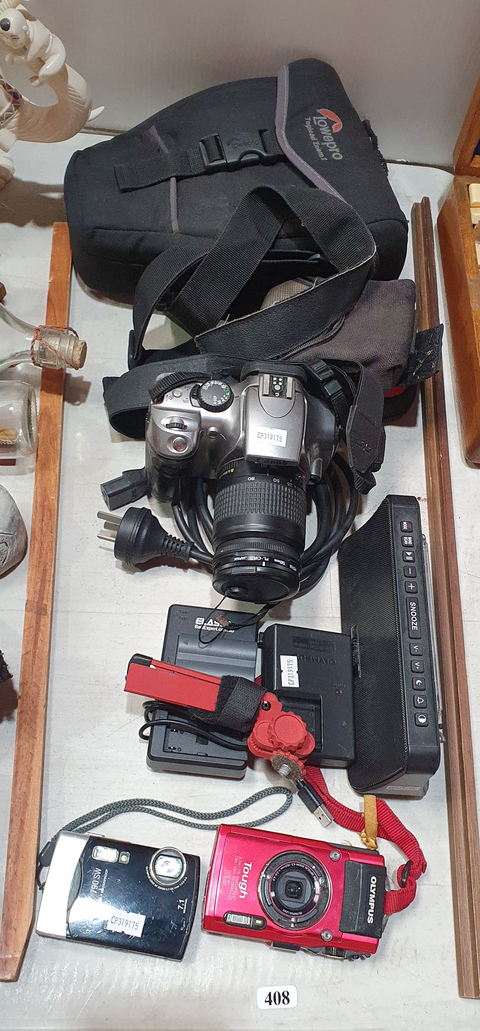 THREE DIGITAL CAMERAS