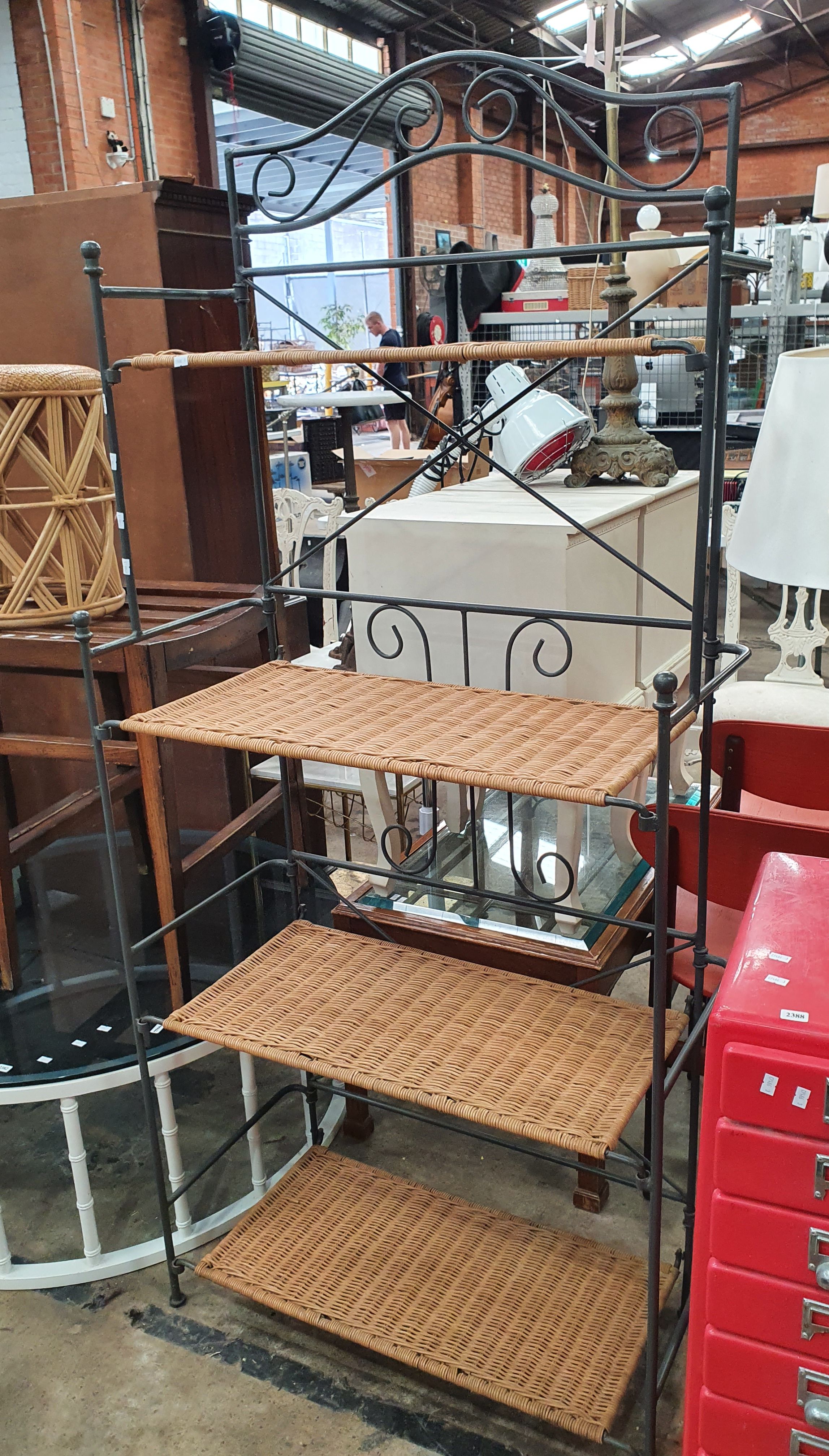 A METAL BAKERS STAND