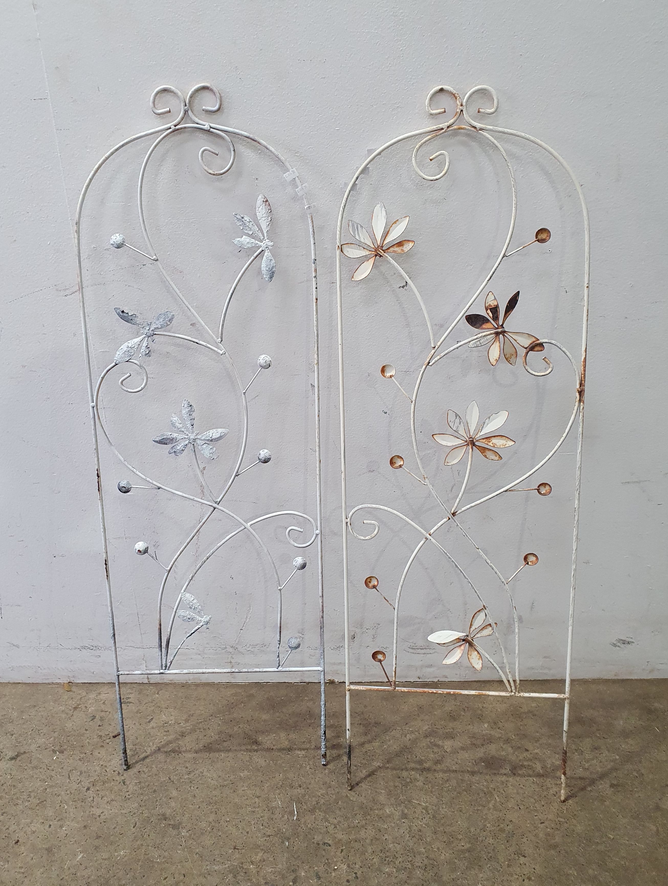 A Pair Of Metal Decorative Panels