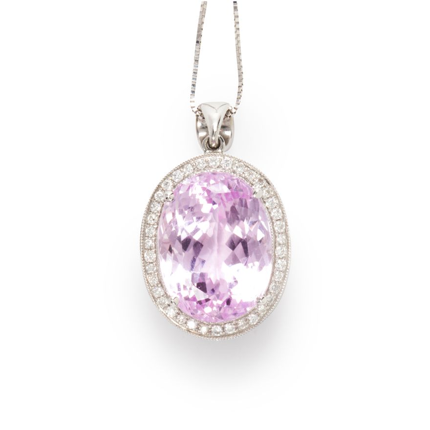 A kunzite, diamond and fourteen karat white gold pendant necklace
