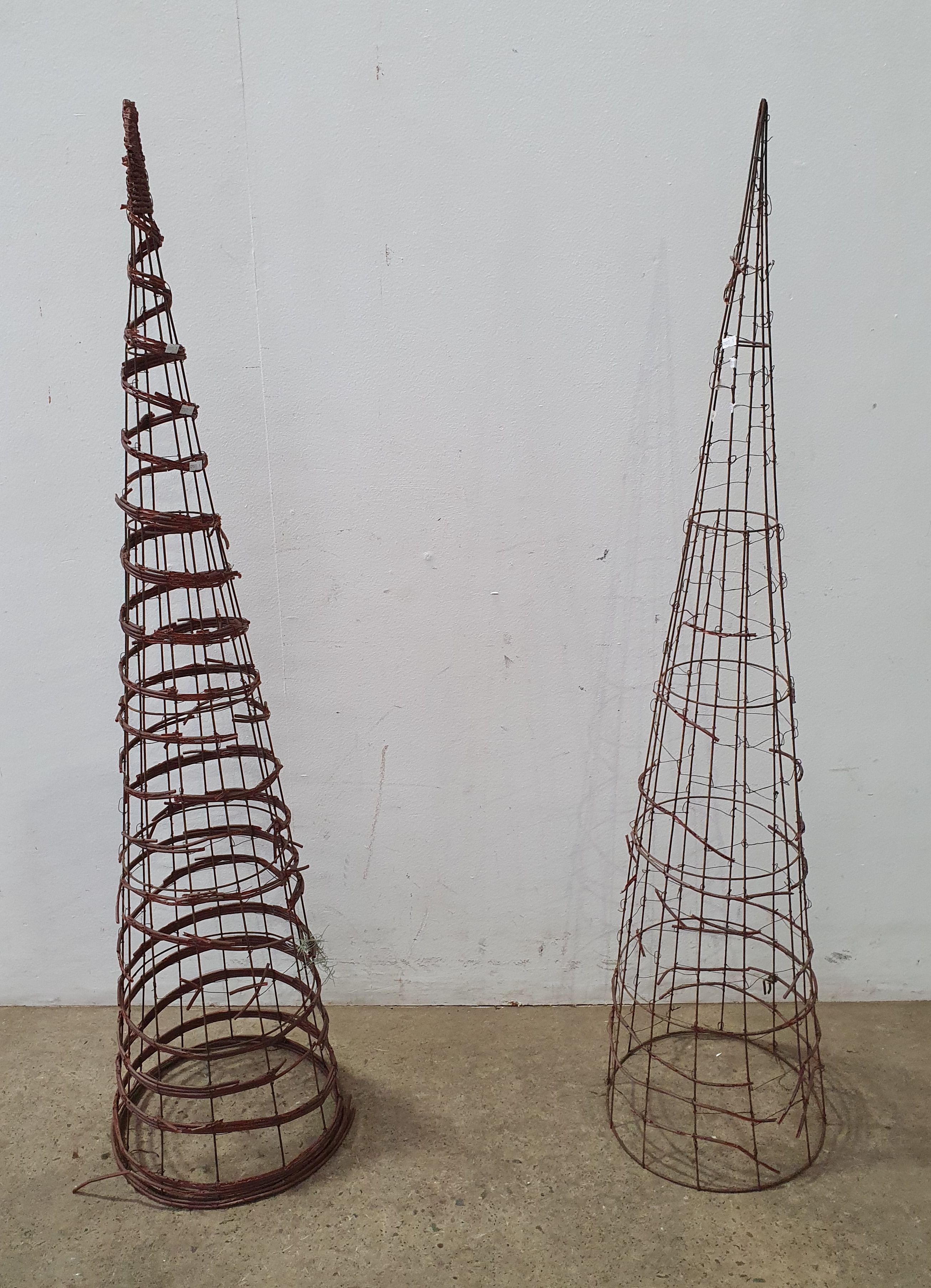 A Pair Of Metal Plant Stands